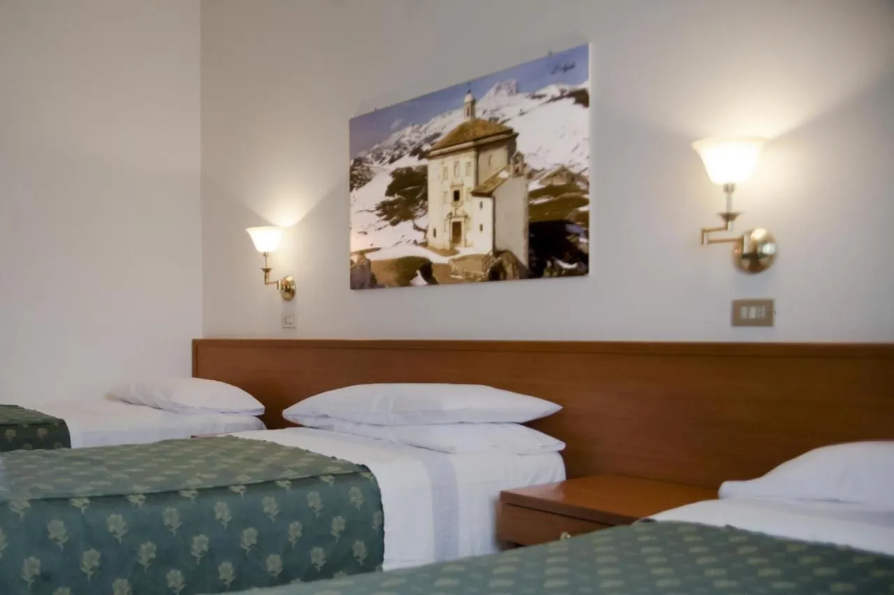 Bed in Hotel Aquila