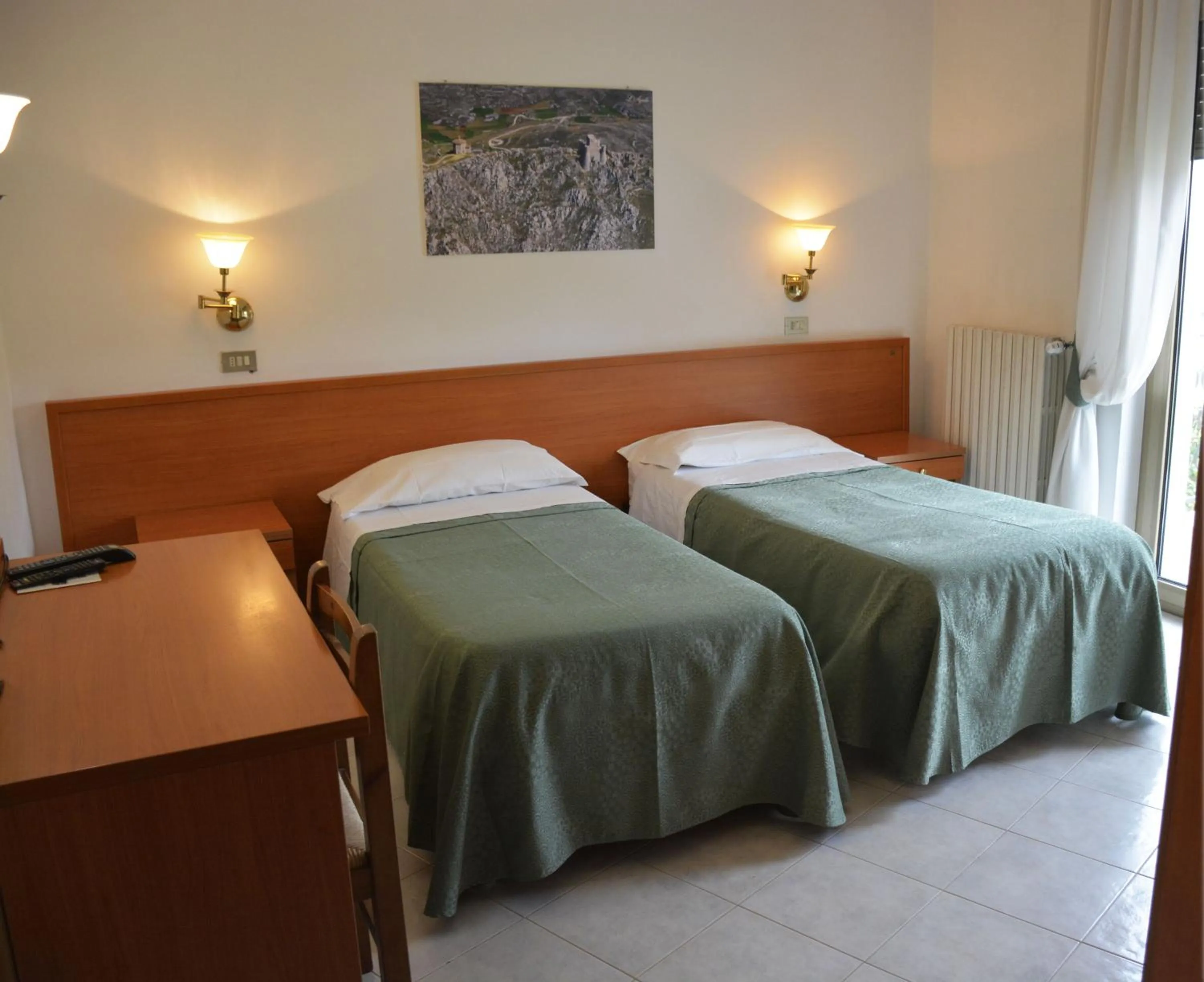 Photo of the whole room, Bed in Hotel Aquila