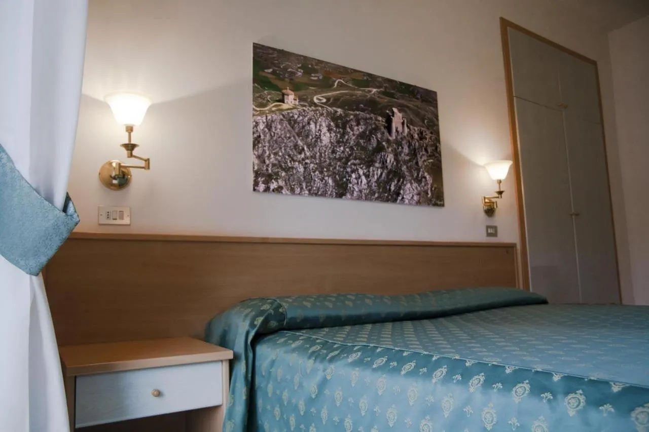 Bed in Hotel Aquila
