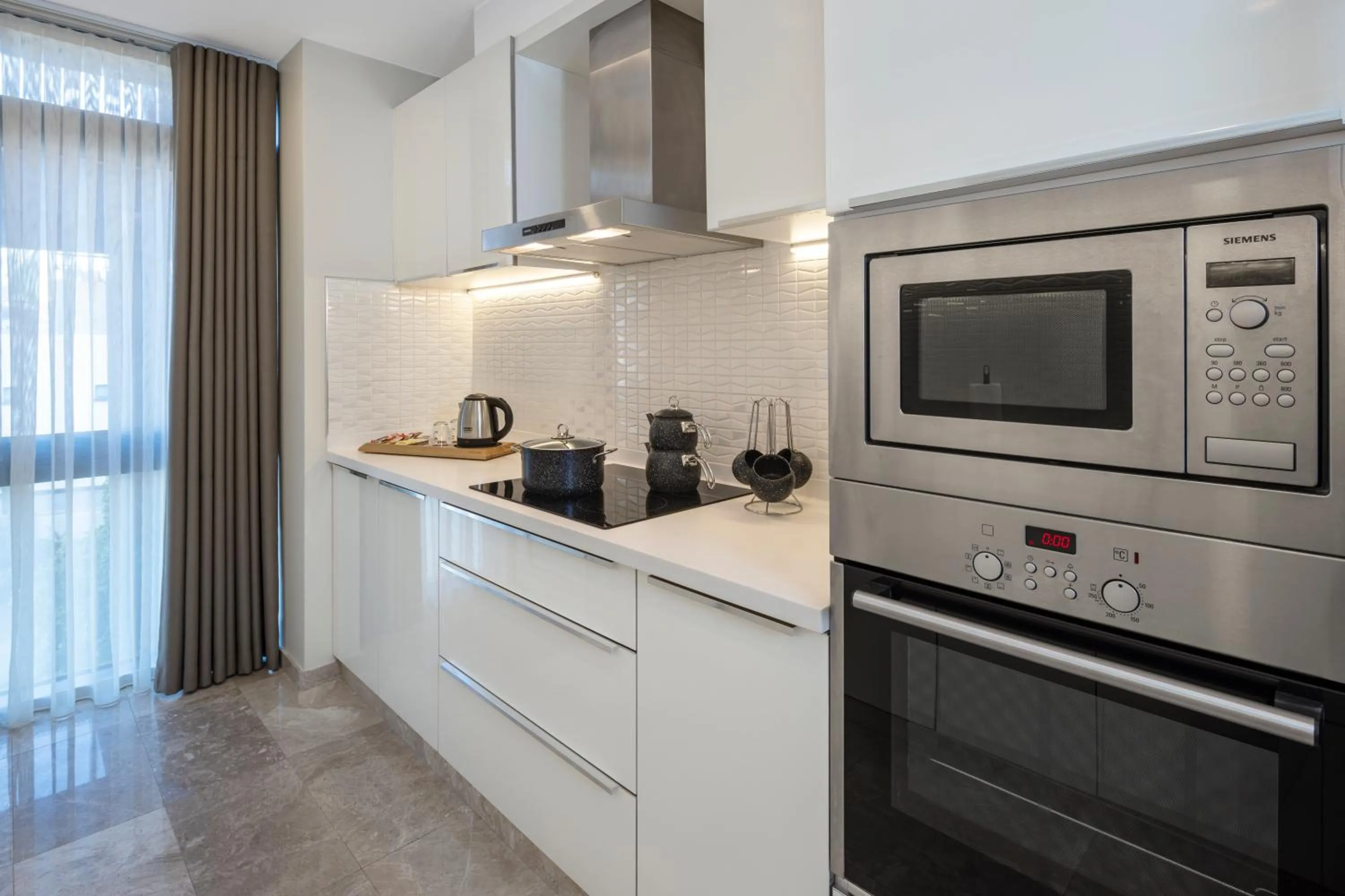 Kitchen or kitchenette in Mayar Residence Hotel