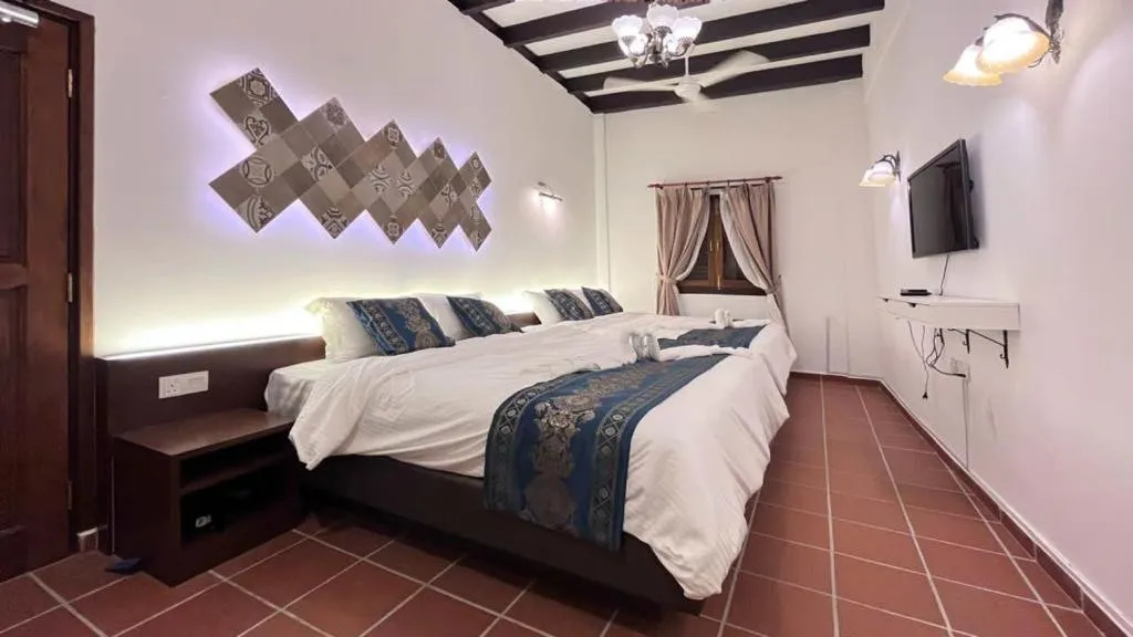 Bed in 19th Century Boutique Hotel