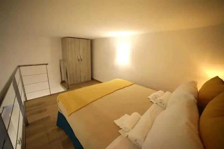 Bed in NANNI LOFT HOUSE