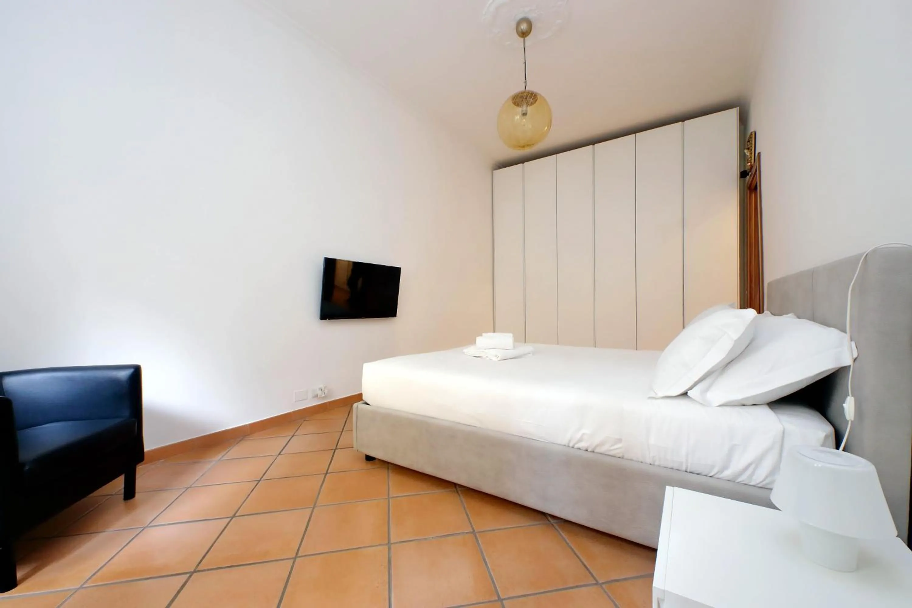 Bed in suity I cozy anglona apartment