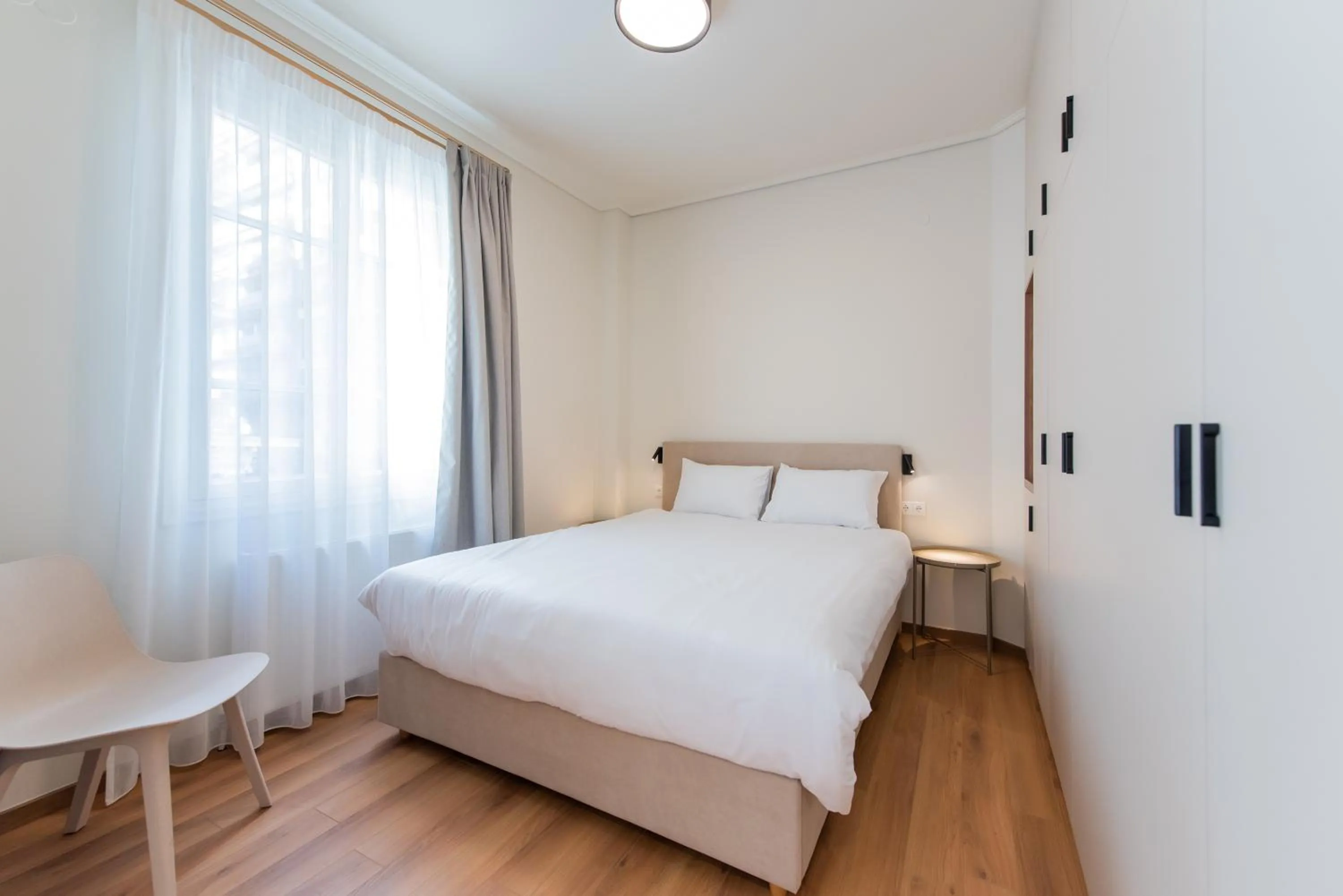 Bed in White Lotus by halu! Apartments