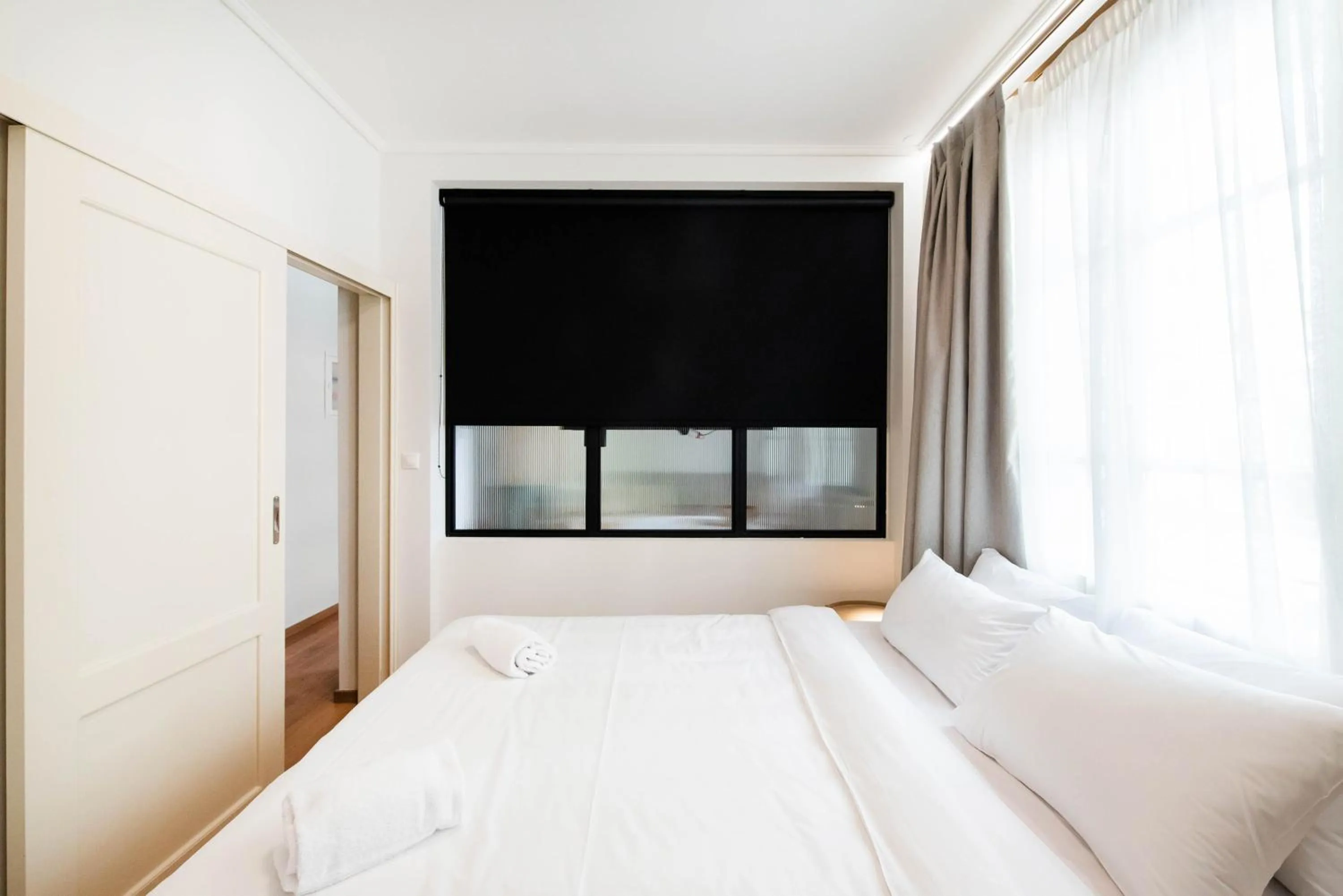 Bed in White Lotus by halu! Apartments