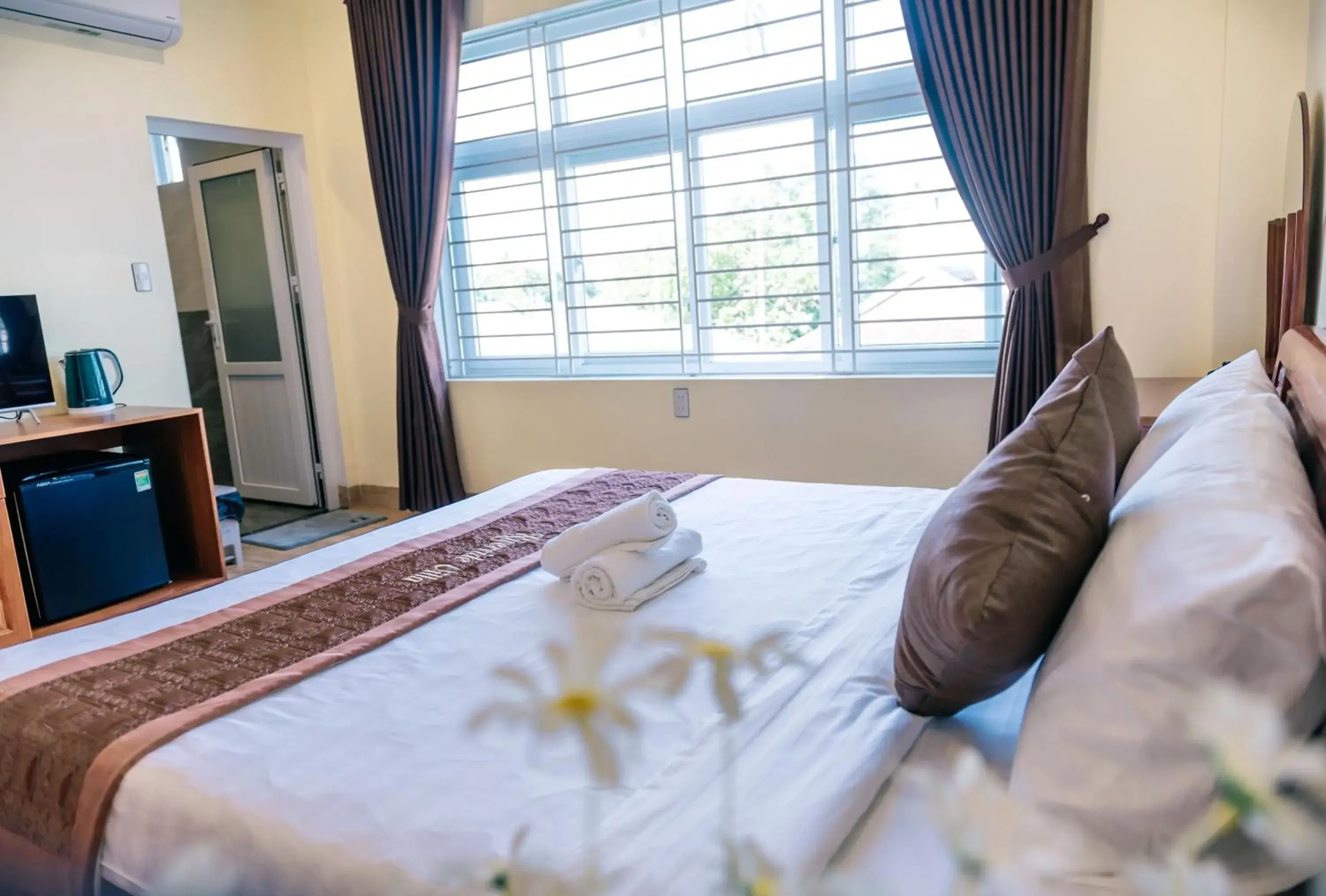 Bed in Orchid Riverside Villa Bed in Orchid Riverside Villa