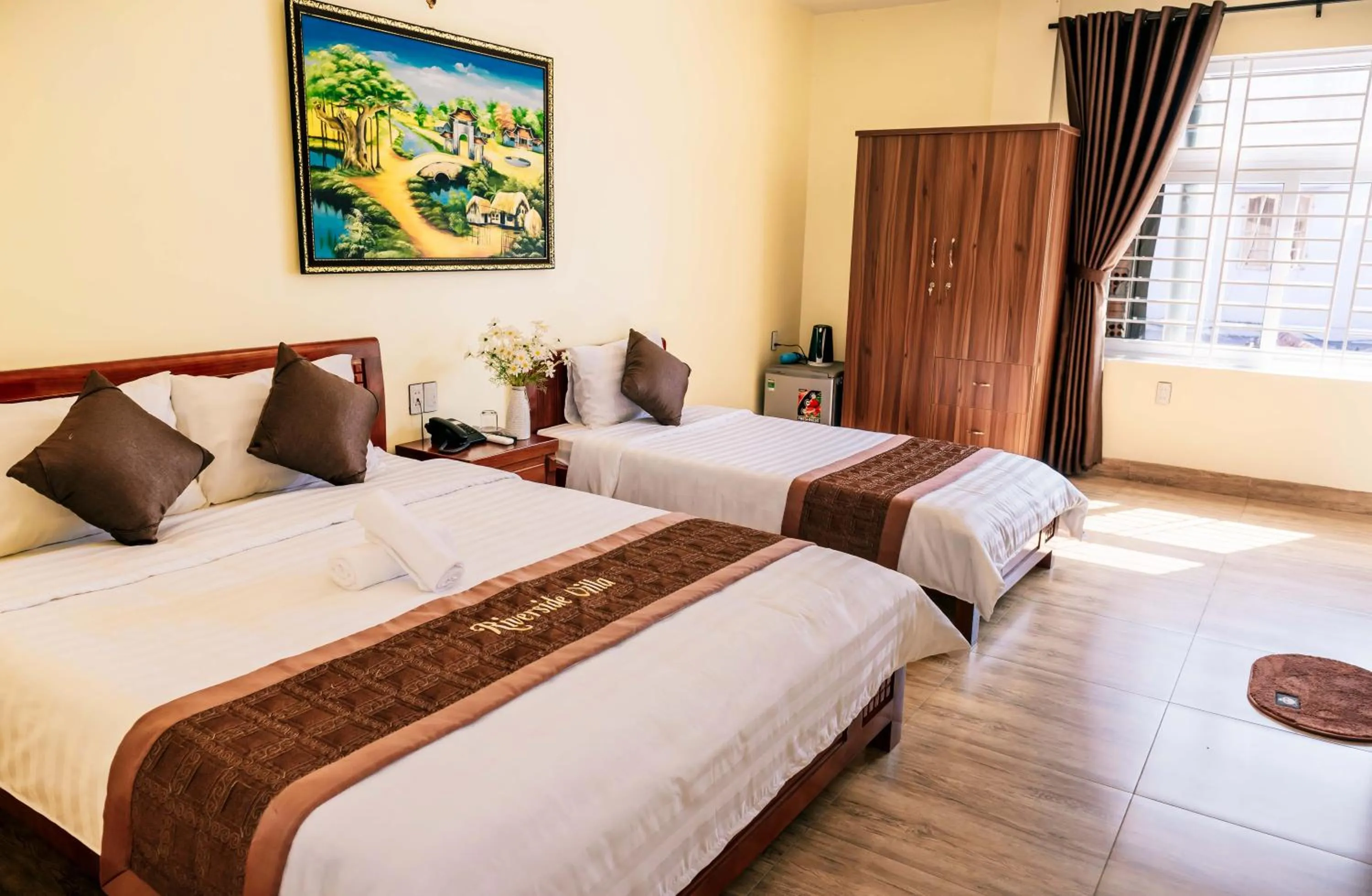 Bed in Orchid Riverside Villa