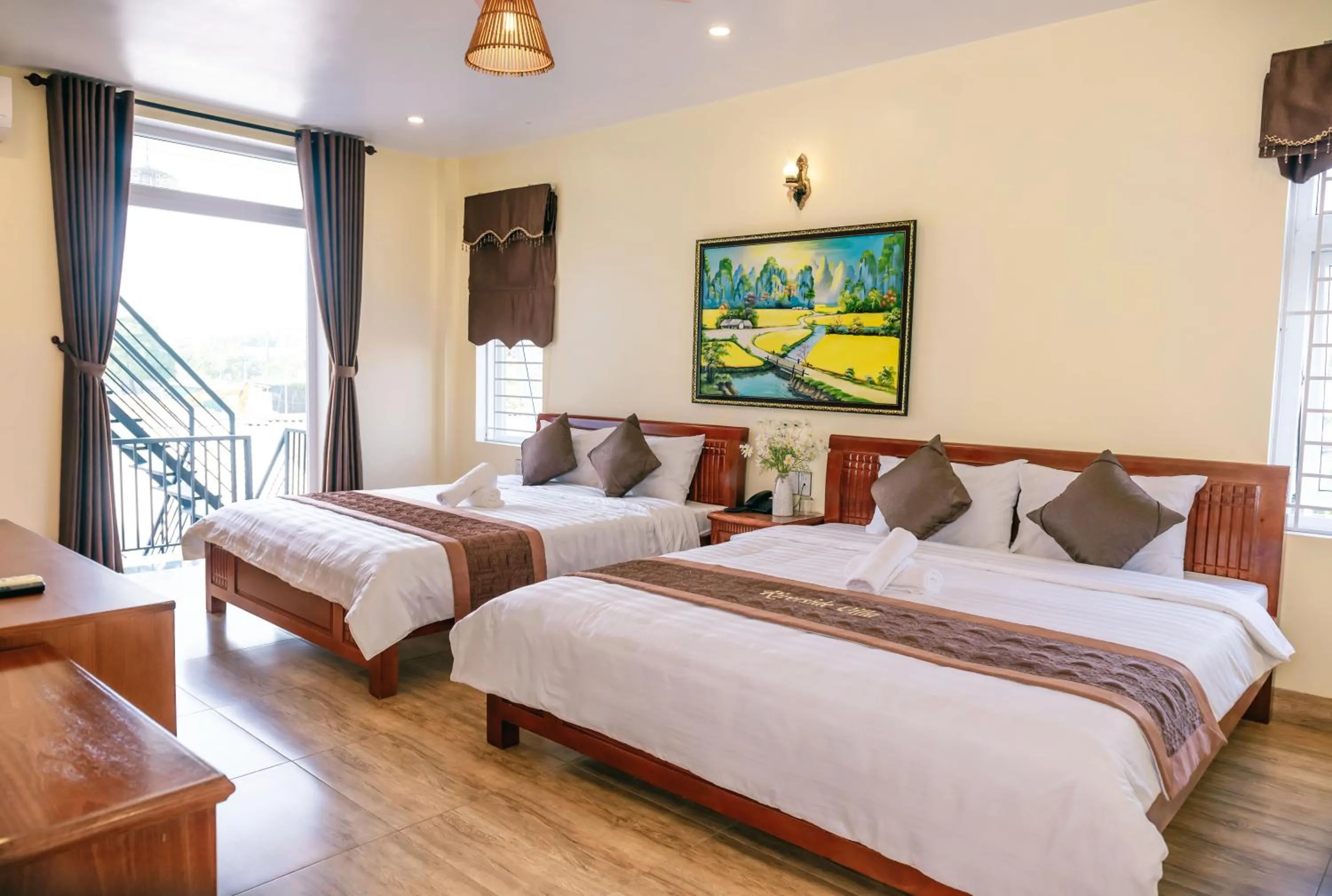 Bed in Orchid Riverside Villa