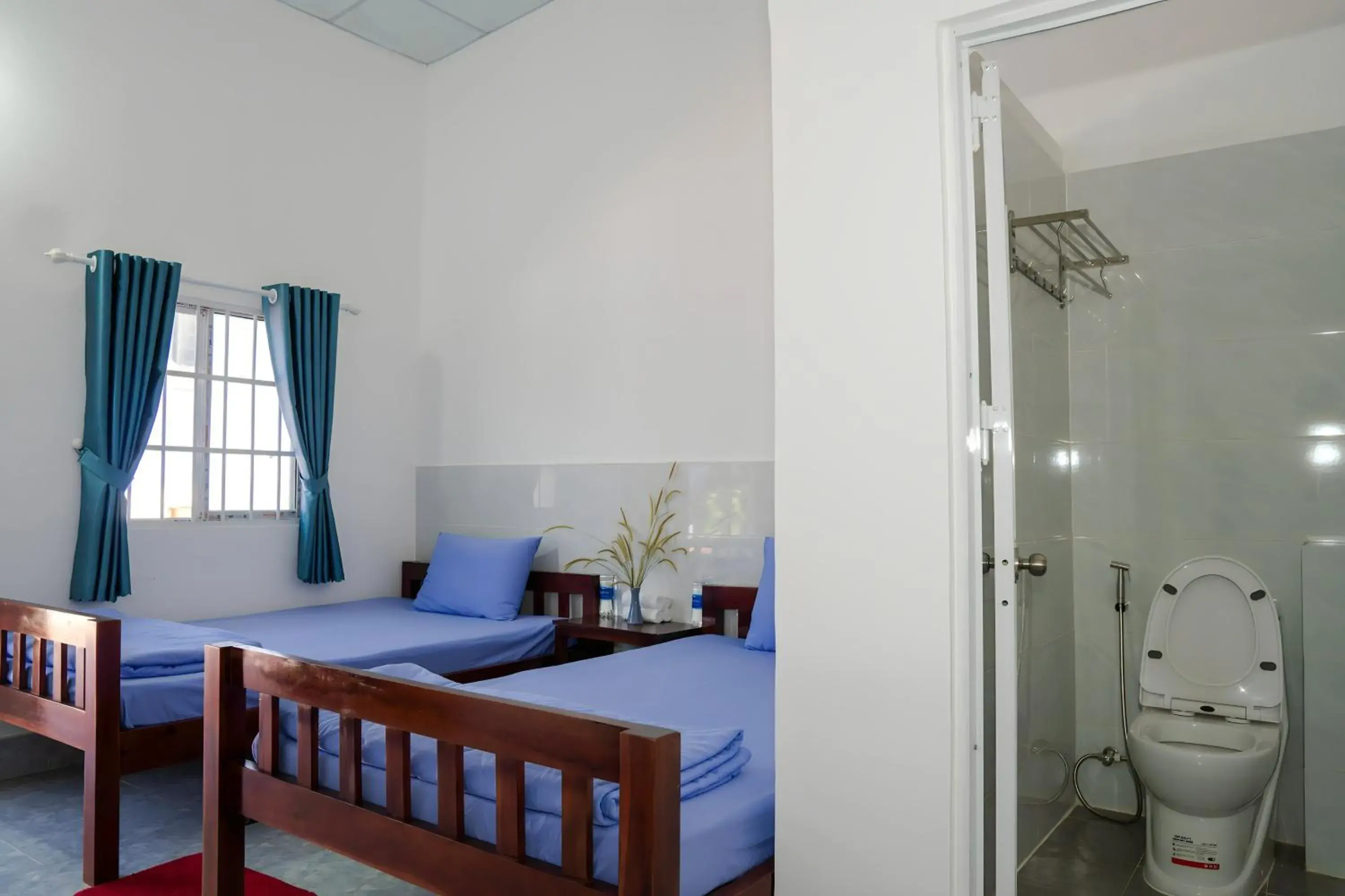 Bed in Nhà Nghỉ Vườn Oải Hương LAVENDER GARDEN GUEST HOUSE Bed in Nhà Nghỉ Vườn Oải Hương LAVENDER GARDEN GUEST HOUSE