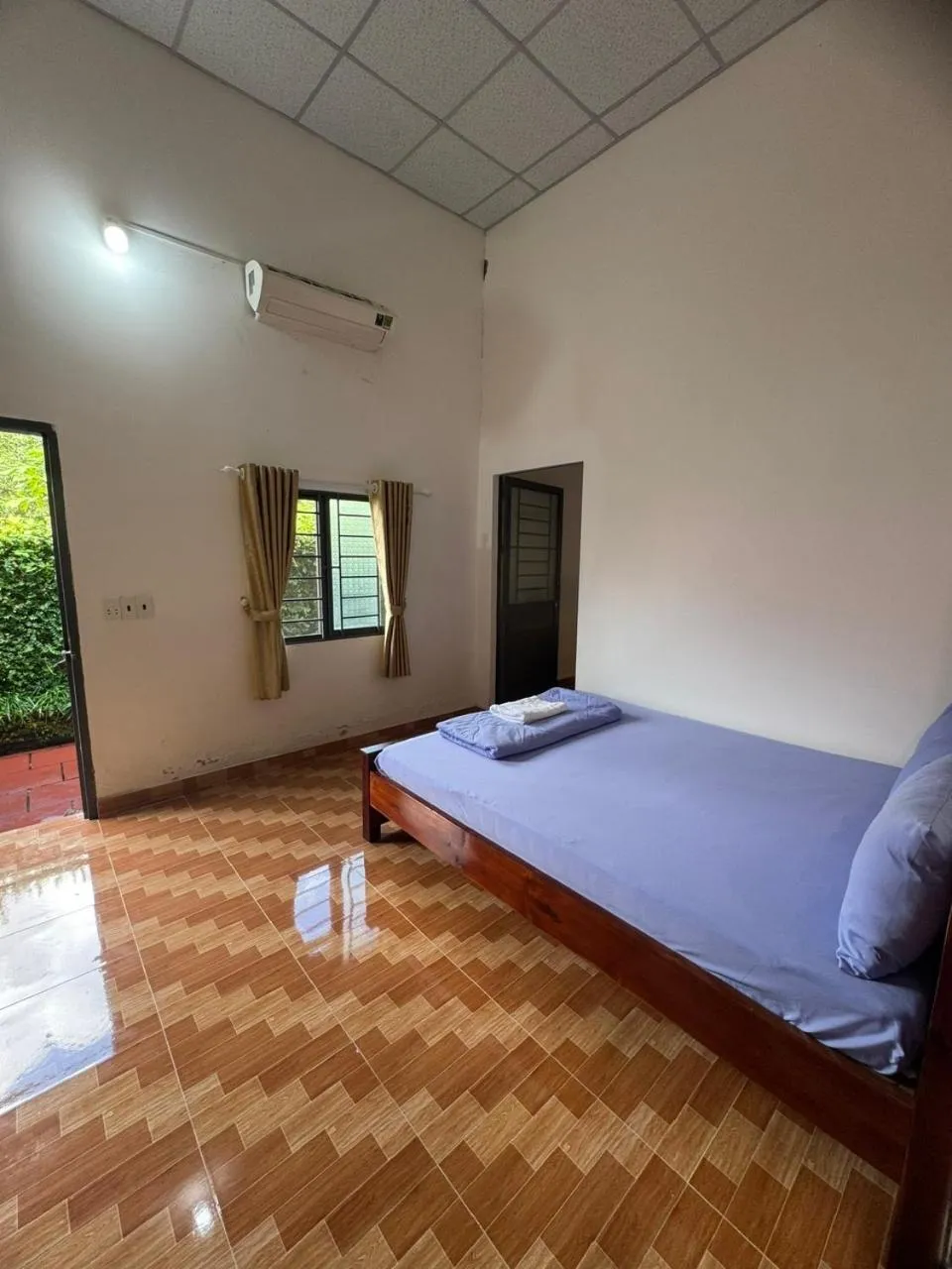 Bed in Nhà Nghỉ Vườn Oải Hương LAVENDER GARDEN GUEST HOUSE