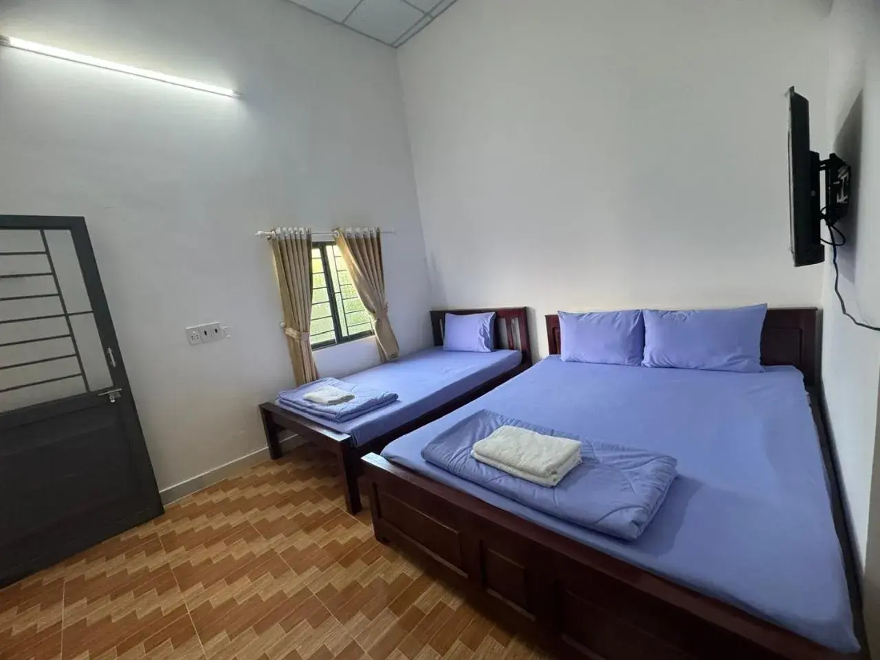 Bed in Nhà Nghỉ Vườn Oải Hương LAVENDER GARDEN GUEST HOUSE Bed in Nhà Nghỉ Vườn Oải Hương LAVENDER GARDEN GUEST HOUSE