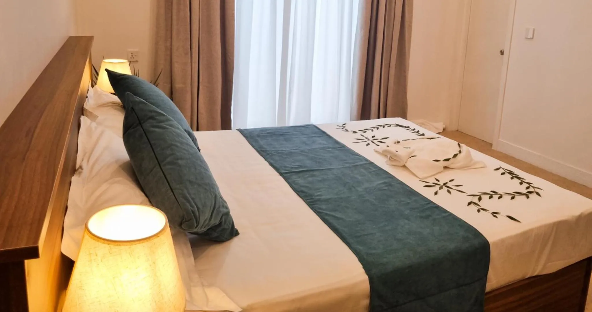 Bed in Vaagali Inn