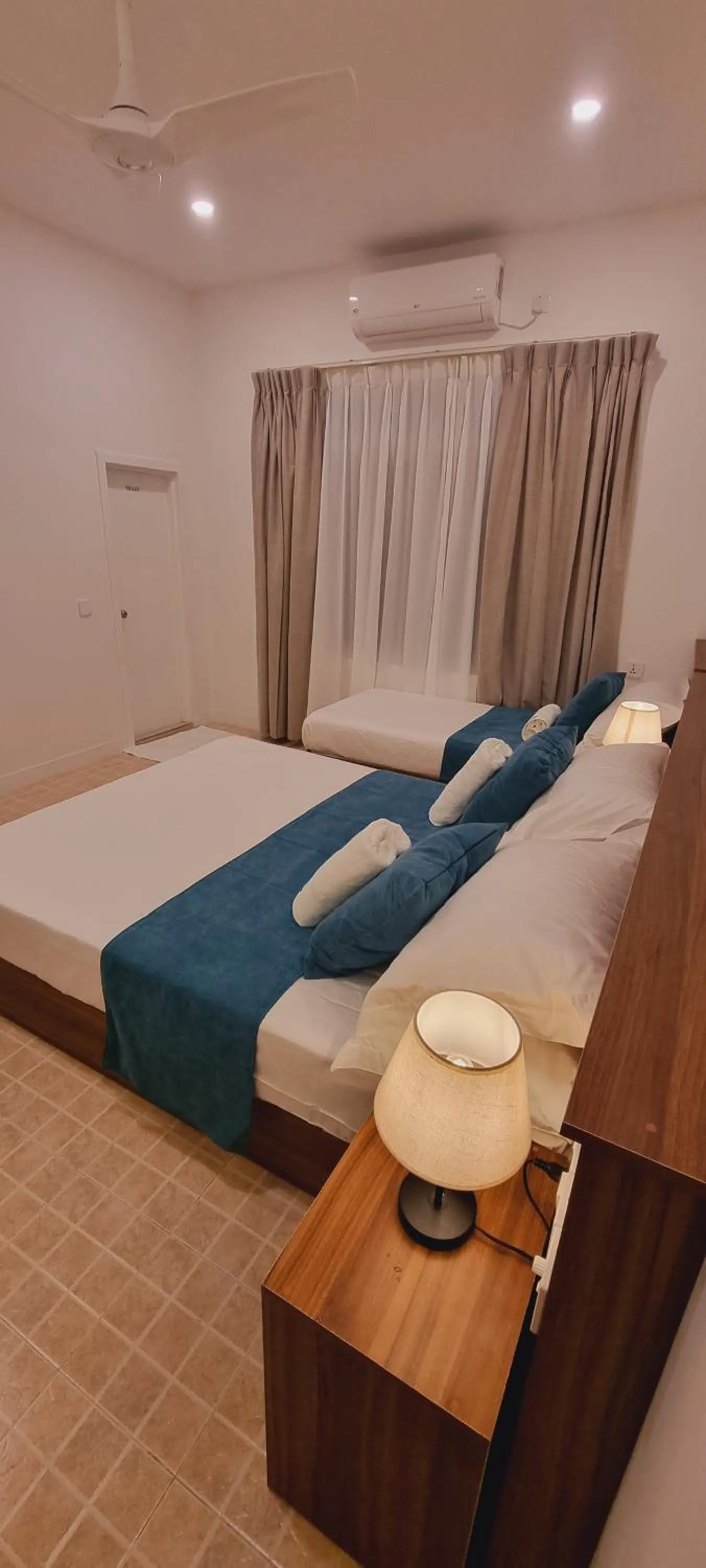 Bed in Vaagali Inn