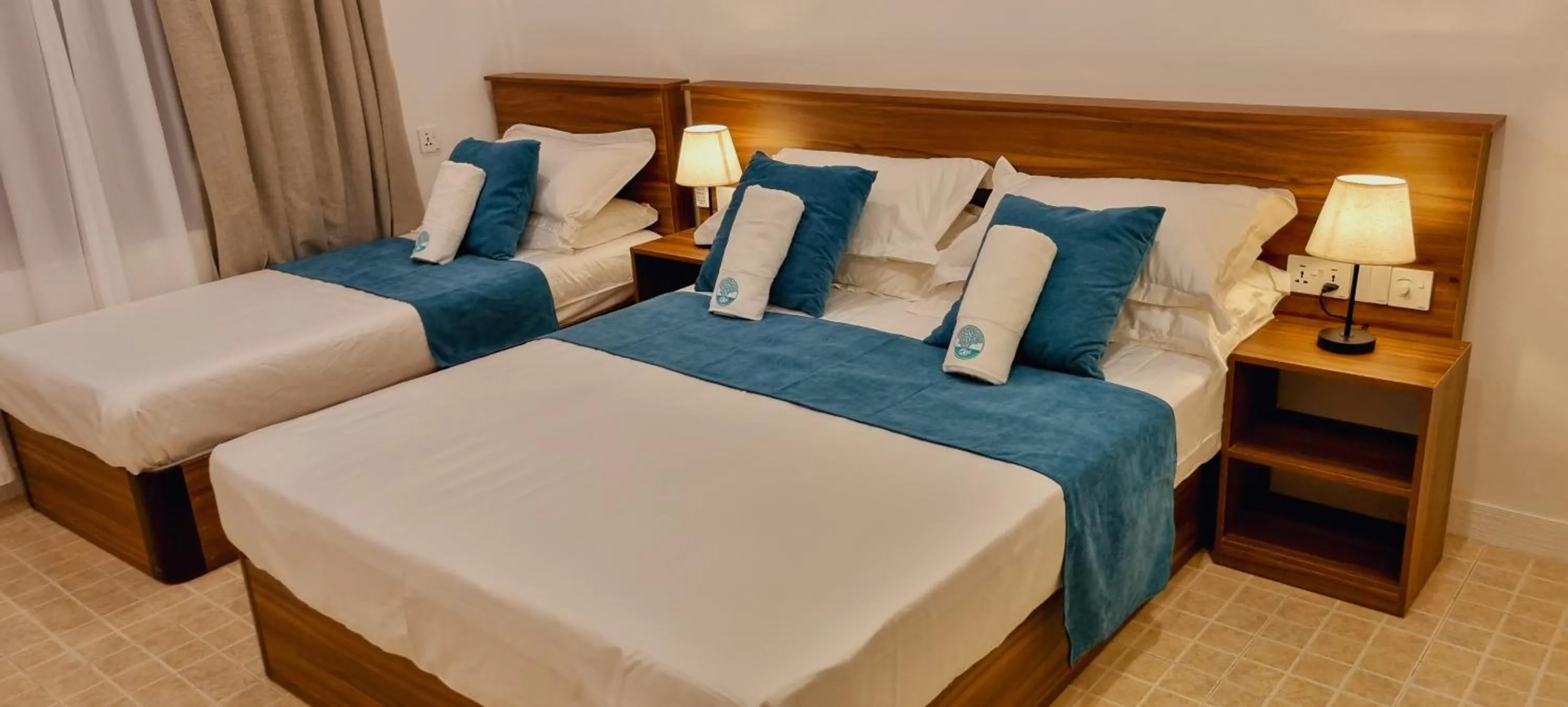 Bed in Vaagali Inn