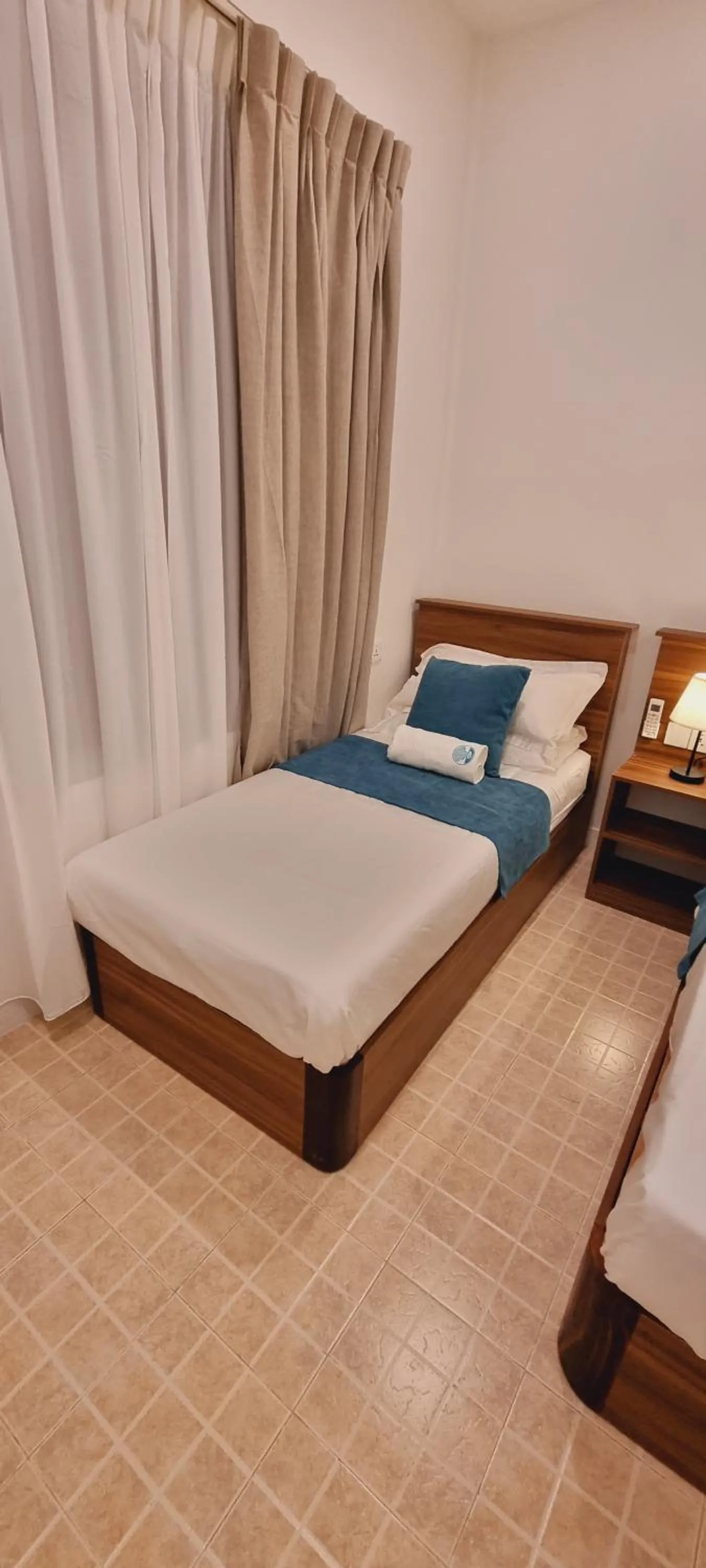 Bed in Vaagali Inn