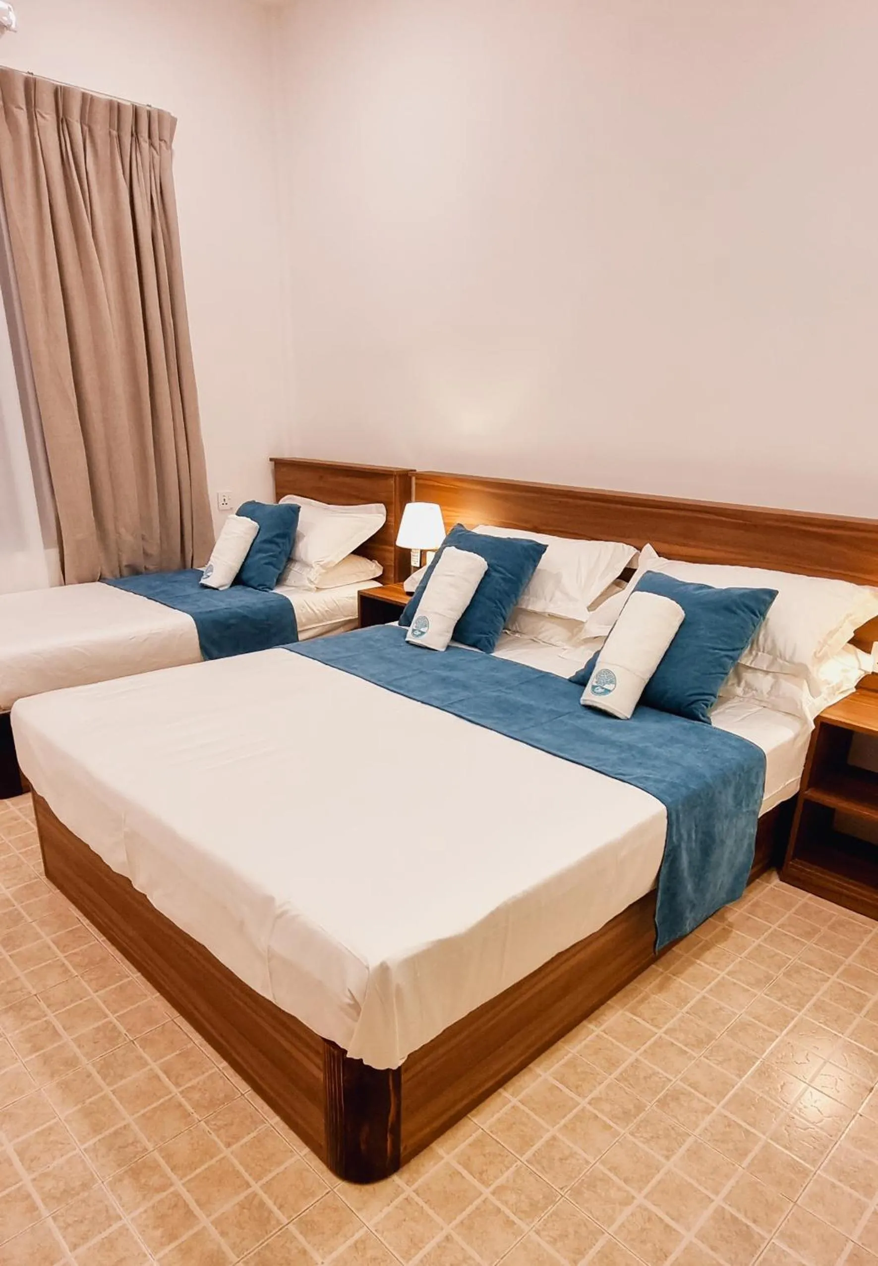 Bed in Vaagali Inn