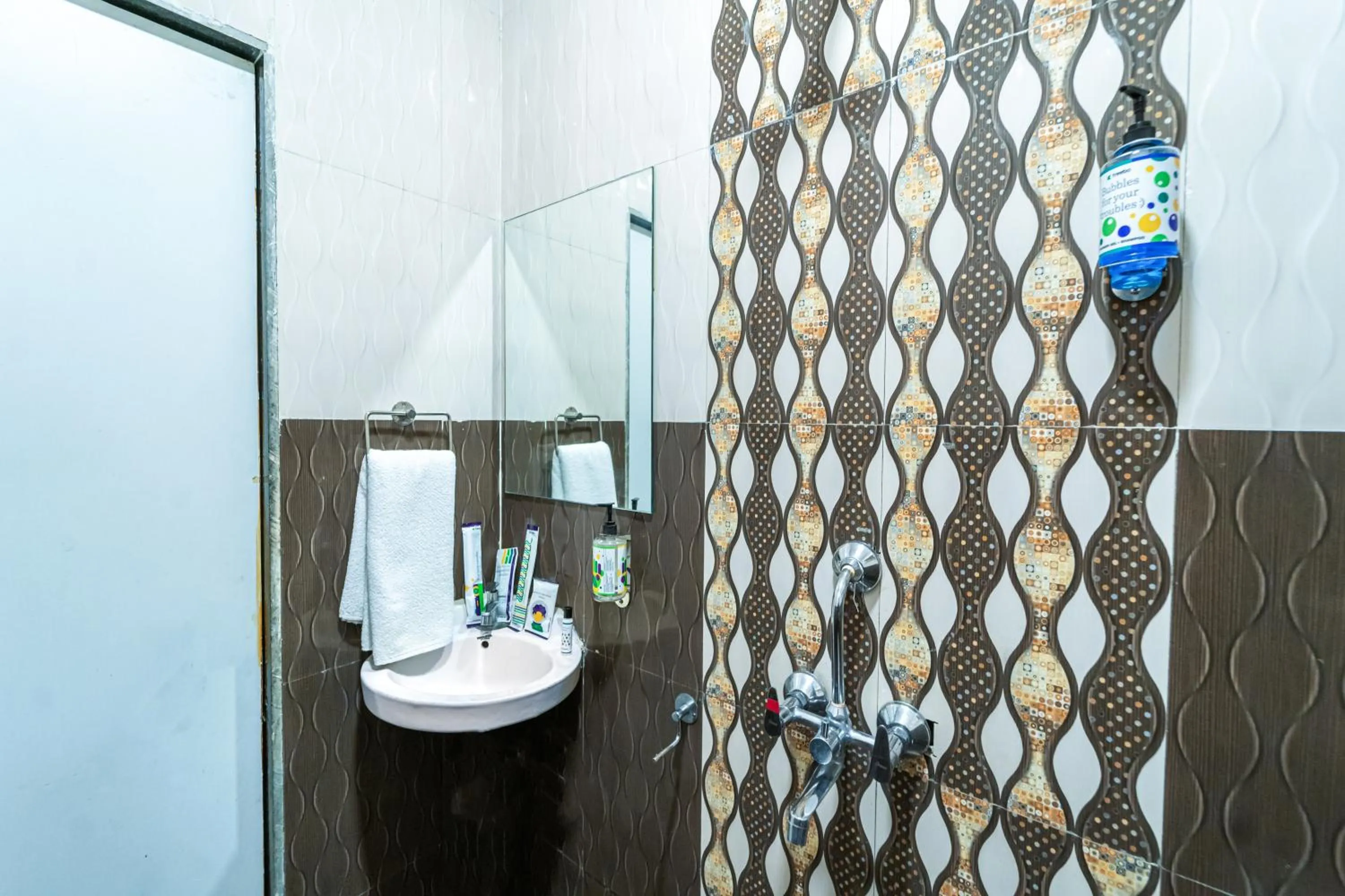 Bathroom in Treebo Kaizen, 3 Kms From Paragliding