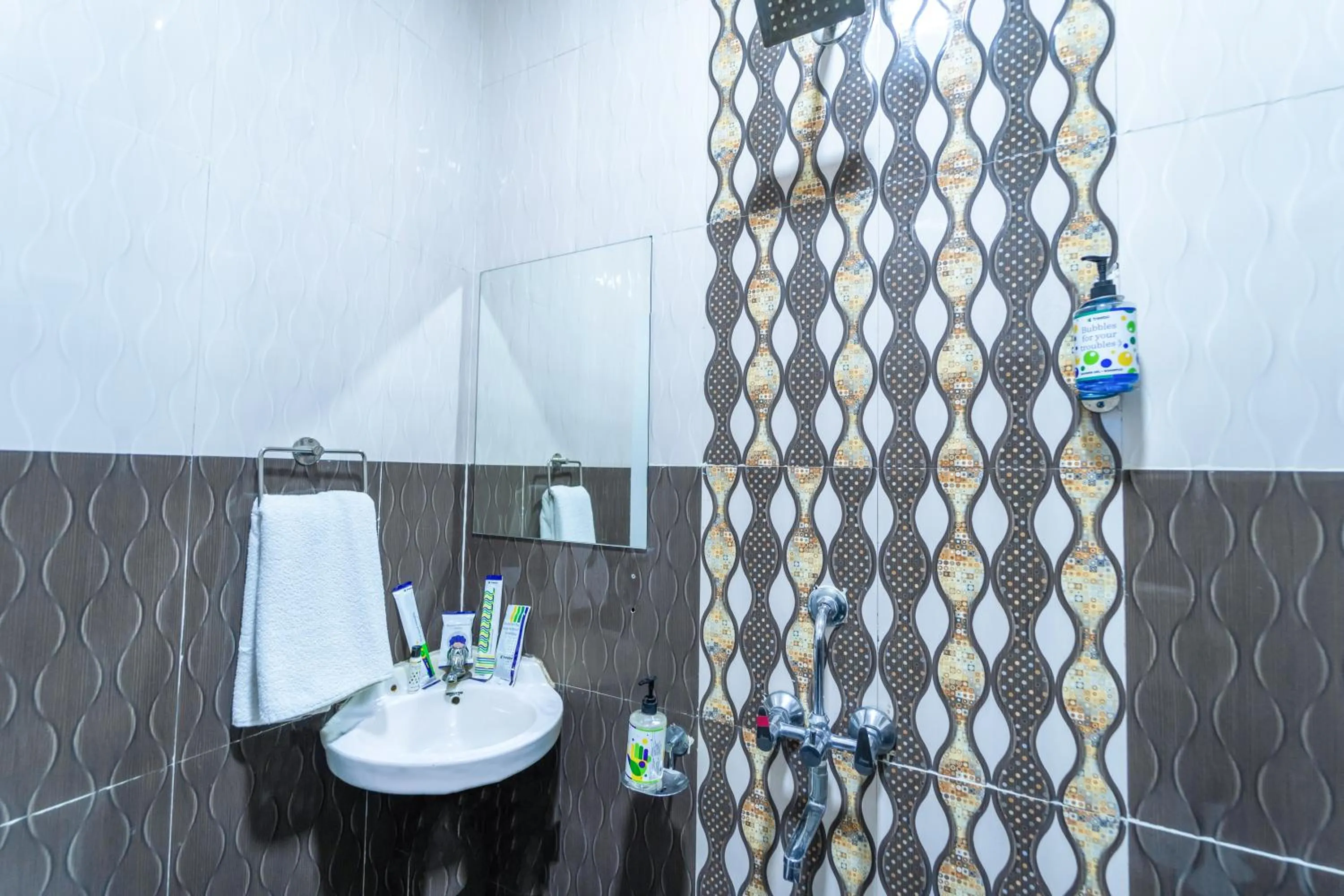 Bathroom in Treebo Kaizen, 3 Kms From Paragliding