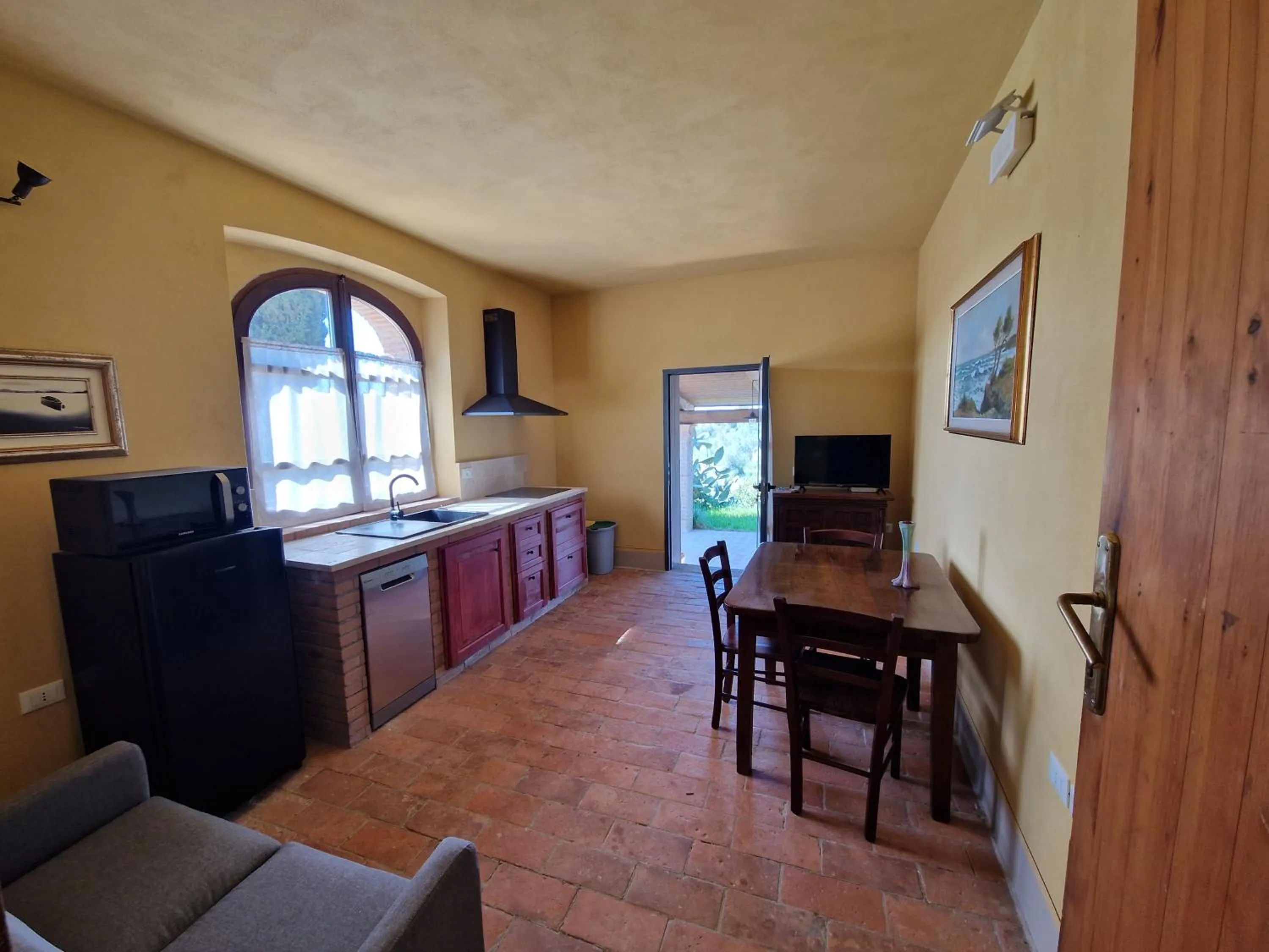 Communal lounge/ TV room in Agriturismo Ai Massi