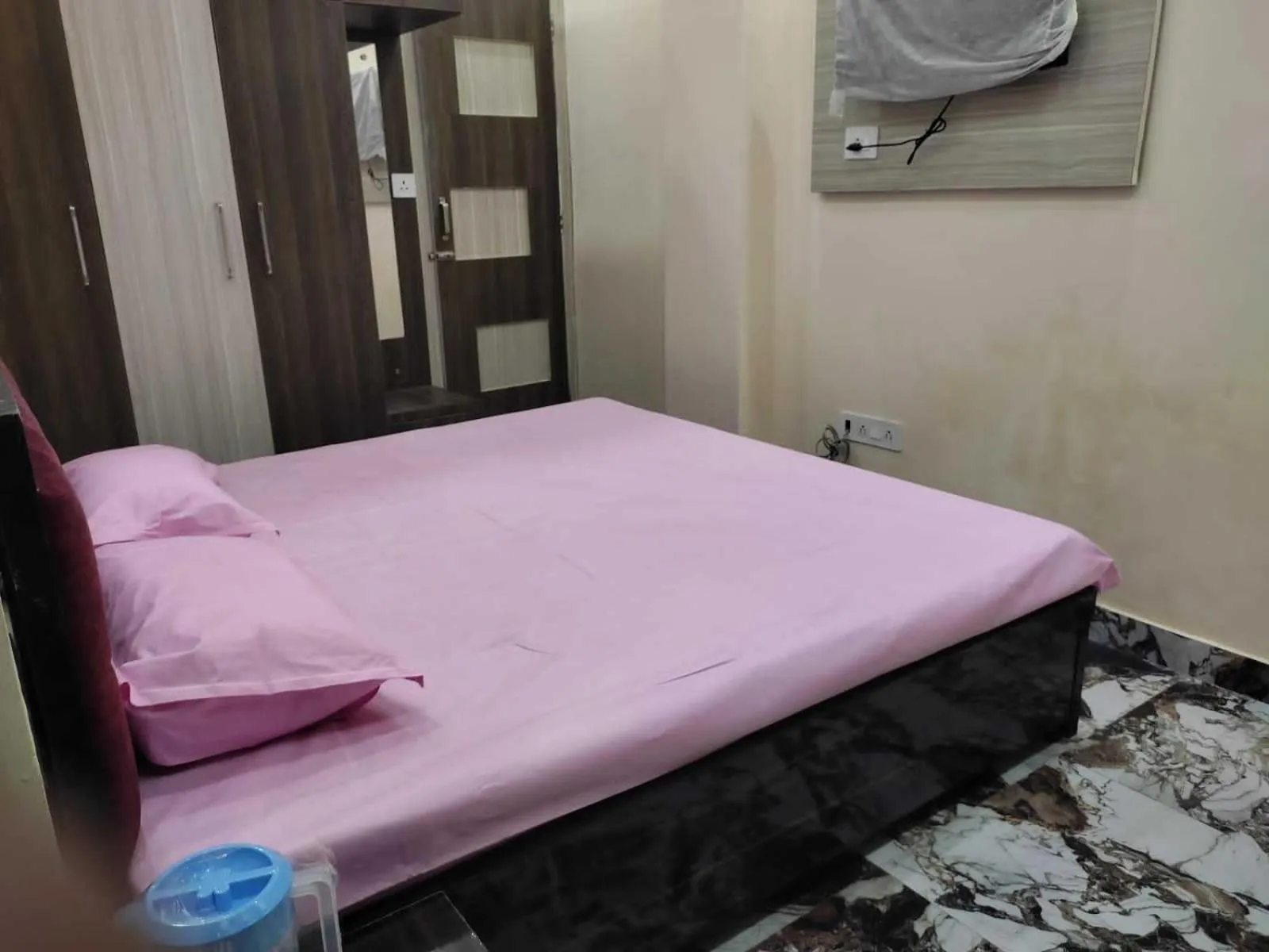 Bedroom in Hotel O Home Aradhya Residency