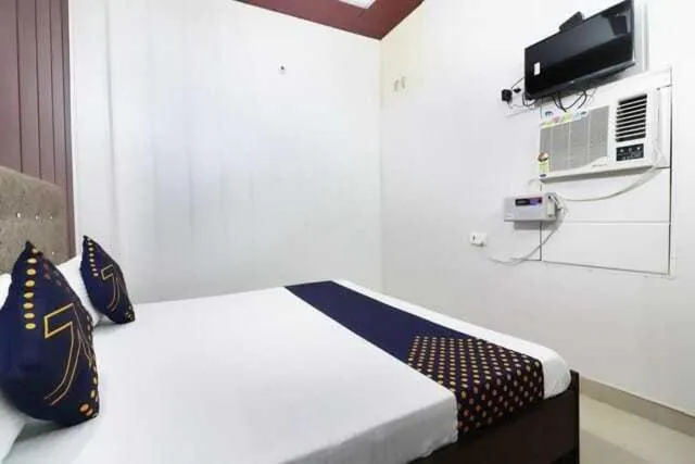 Bedroom in Hotel O Home Aradhya Residency