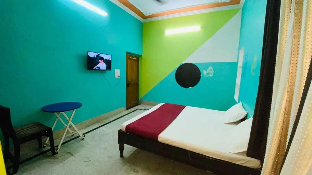 Bedroom in Hotel O Home Aradhya Residency