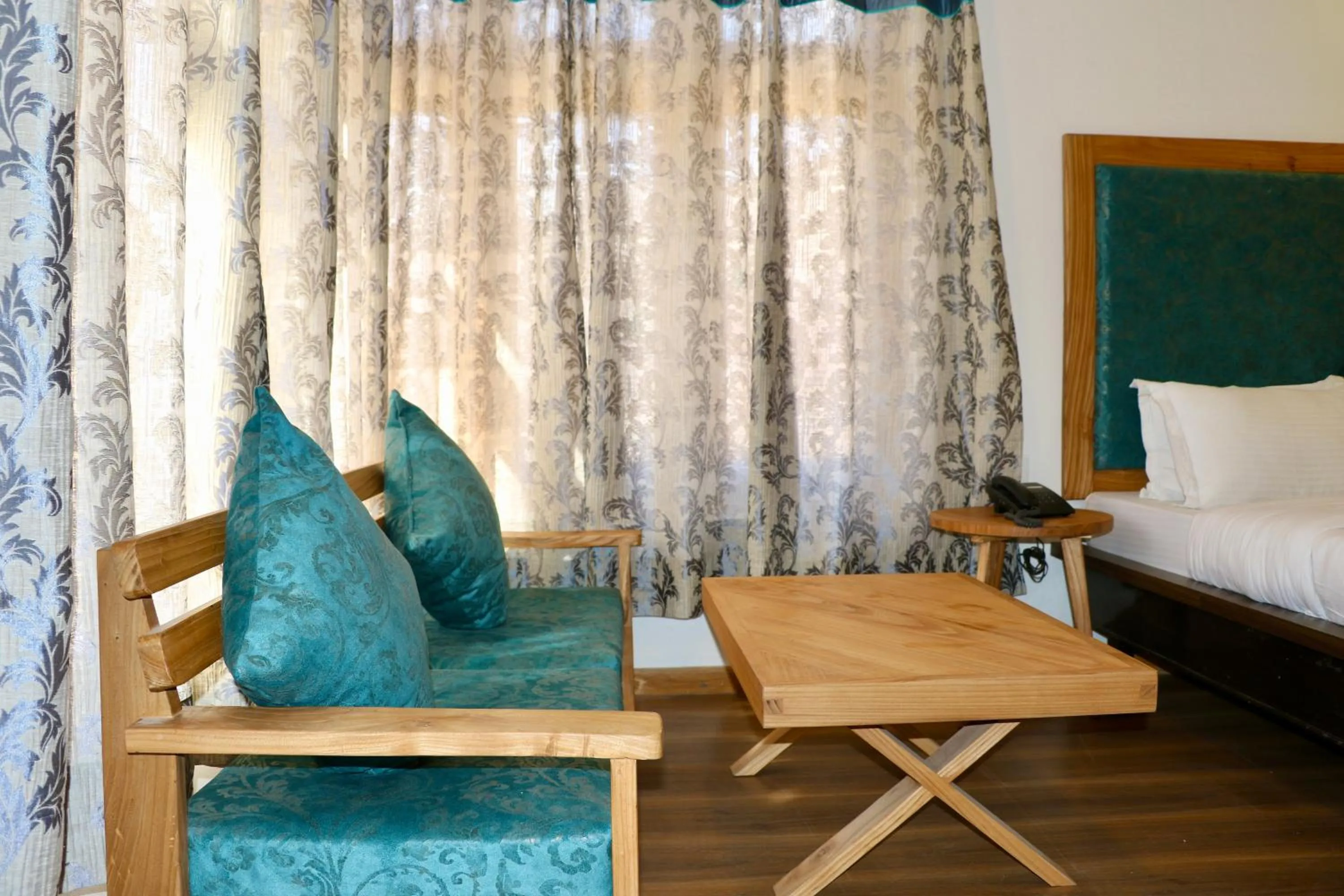 Seating area in Hotel Palam Hills