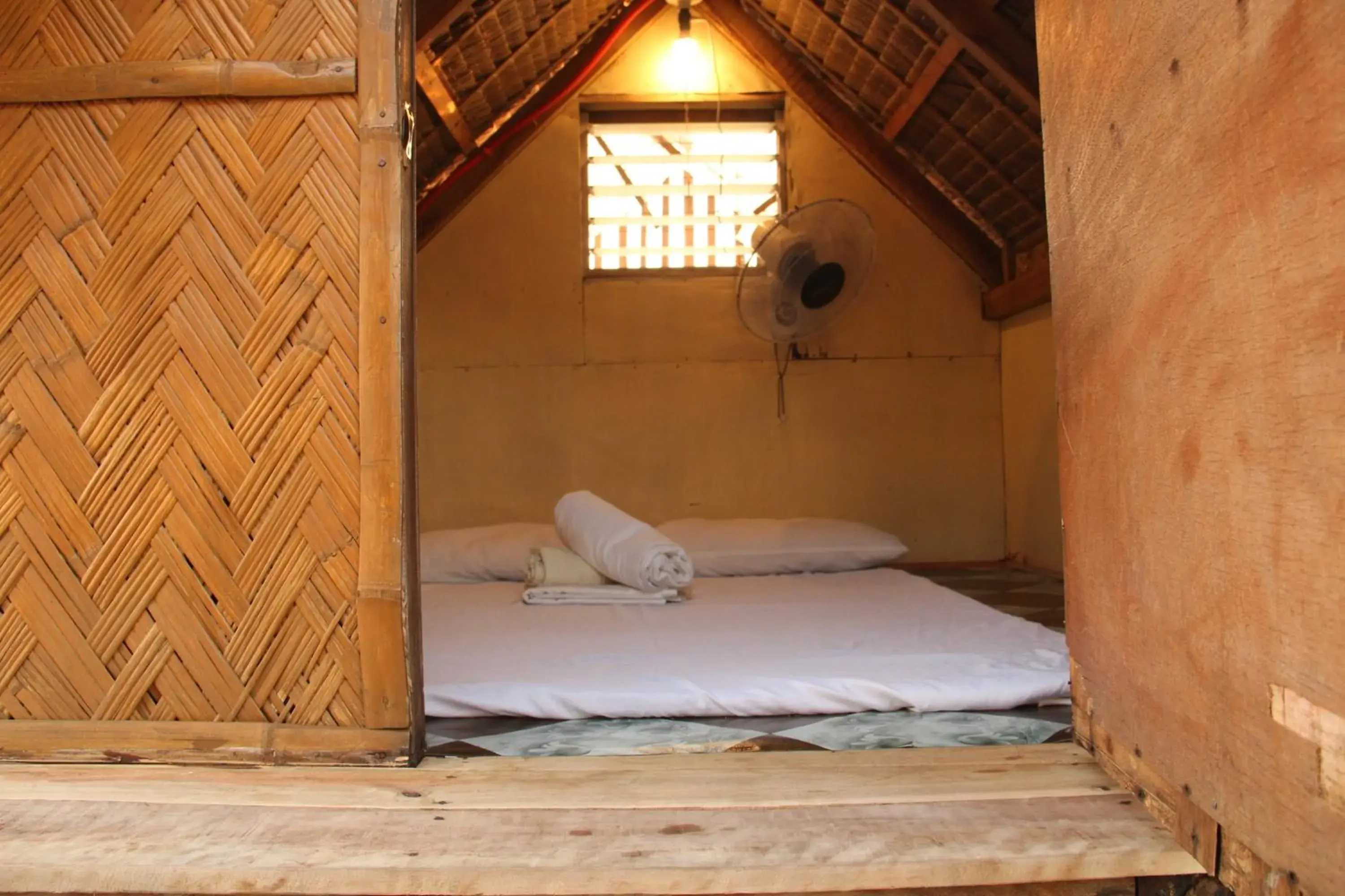 Bed in Good Guys Beach Resort Bed in Good Guys Beach Resort