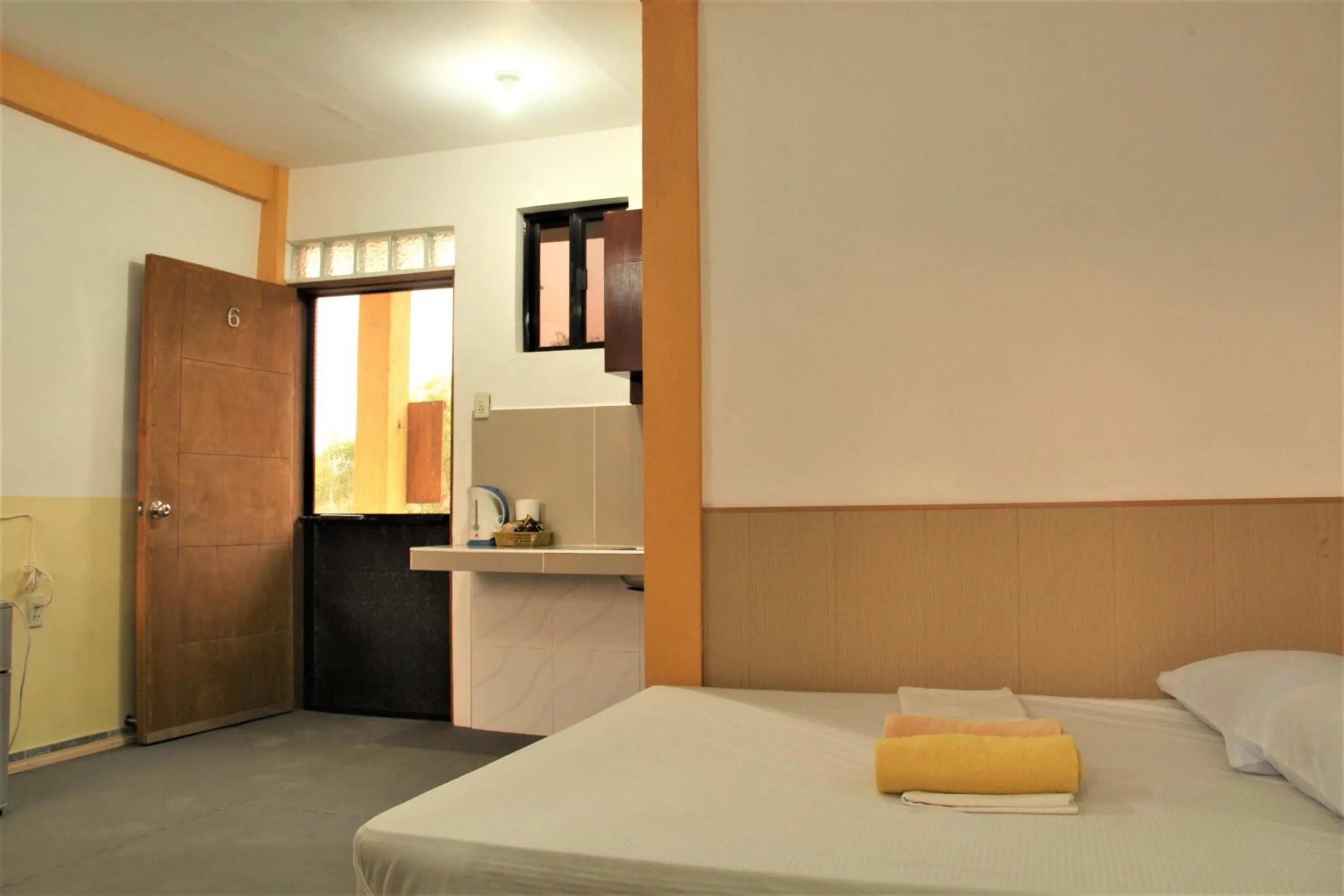 Bed in Good Guys Beach Resort