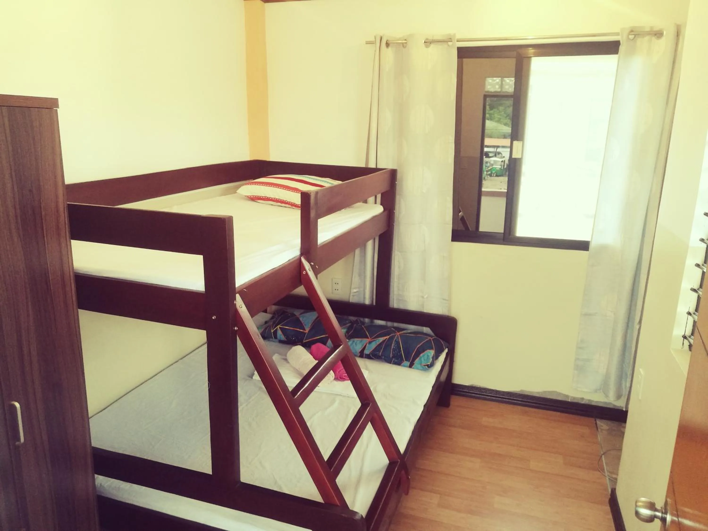 Bed in Good Guys Beach Resort