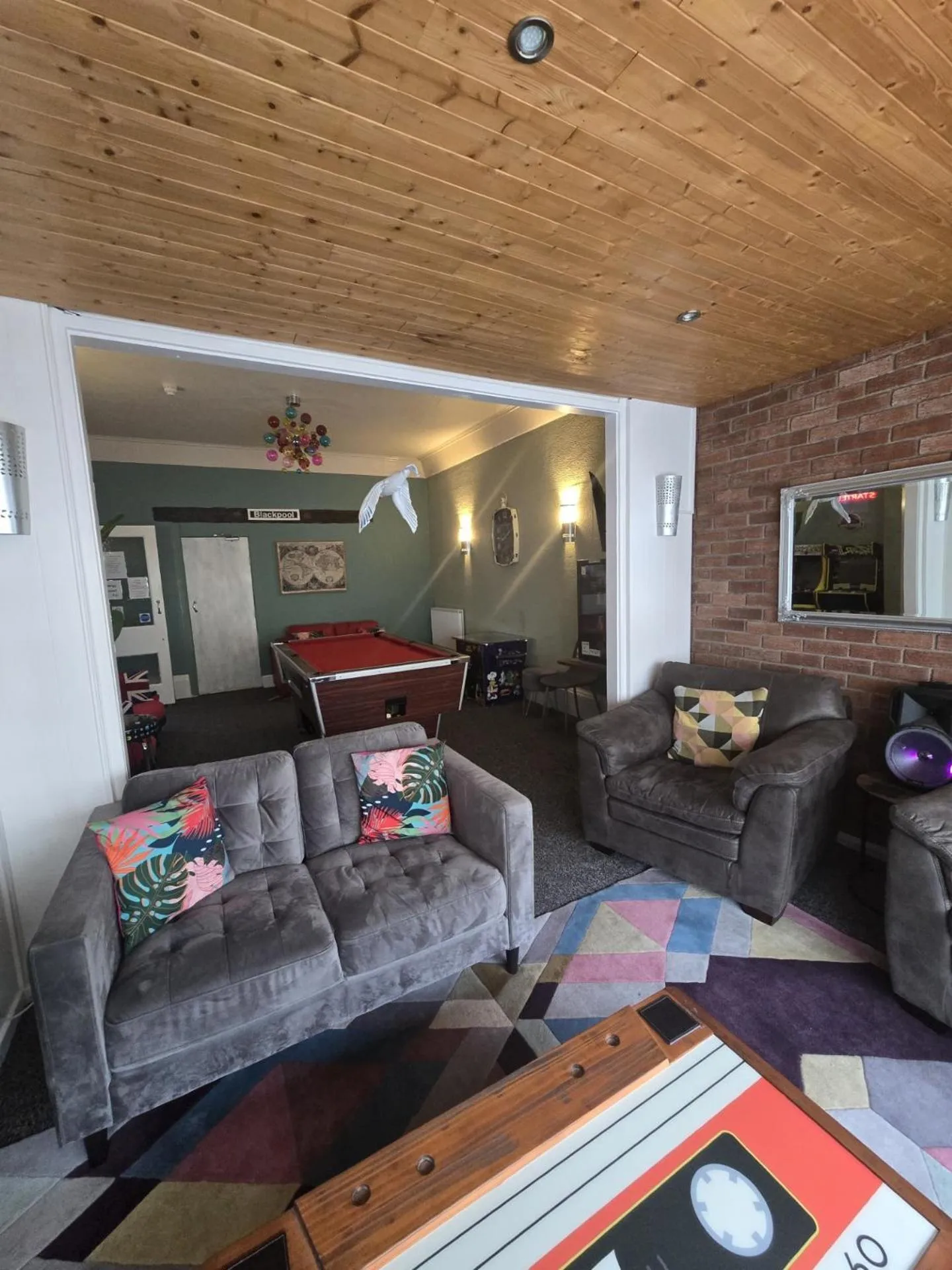 Communal lounge/ TV room in Maydene Hotel