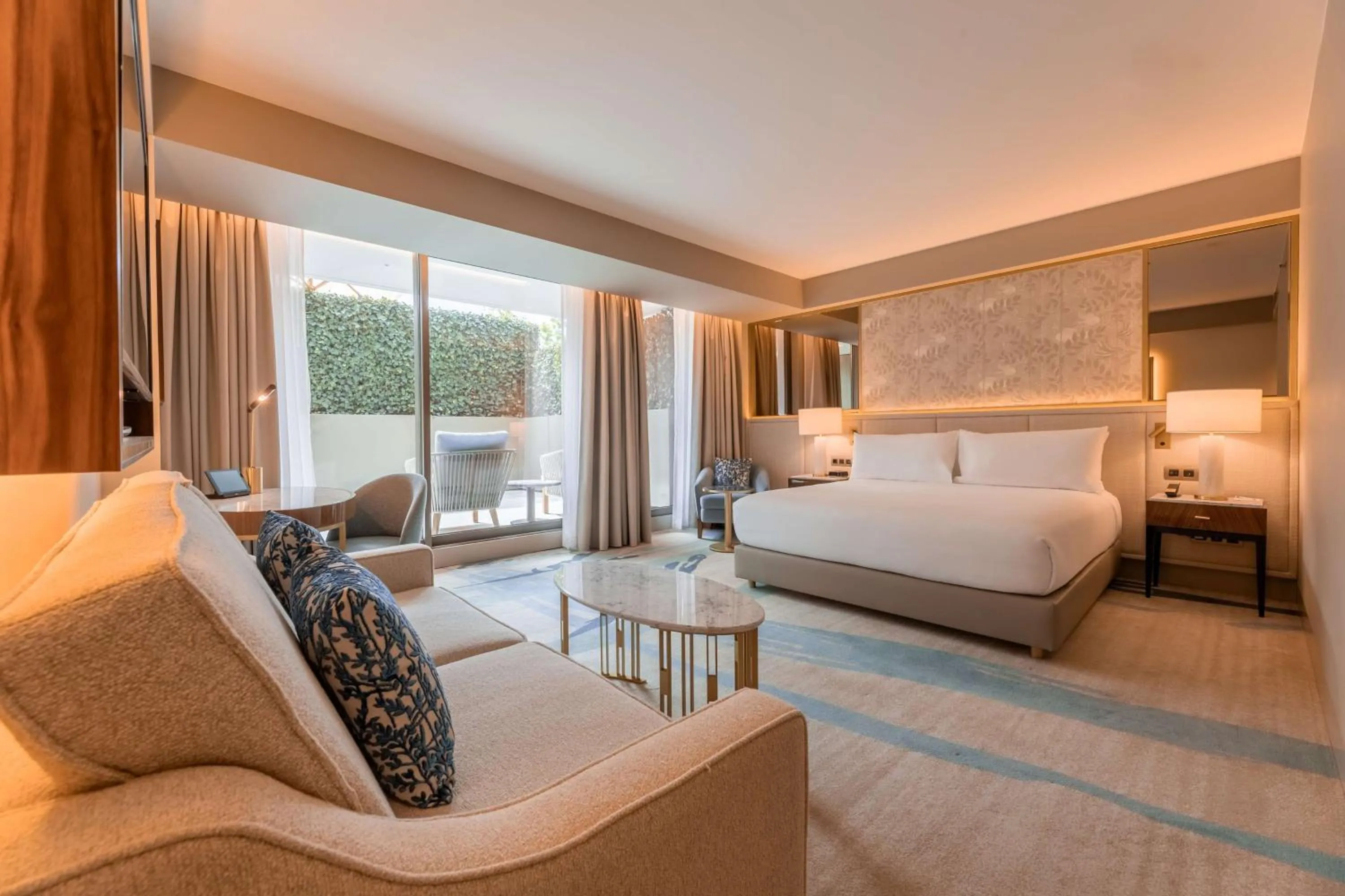Living room, Bed in Legacy Hotel Cascais, Curio Collection By Hilton