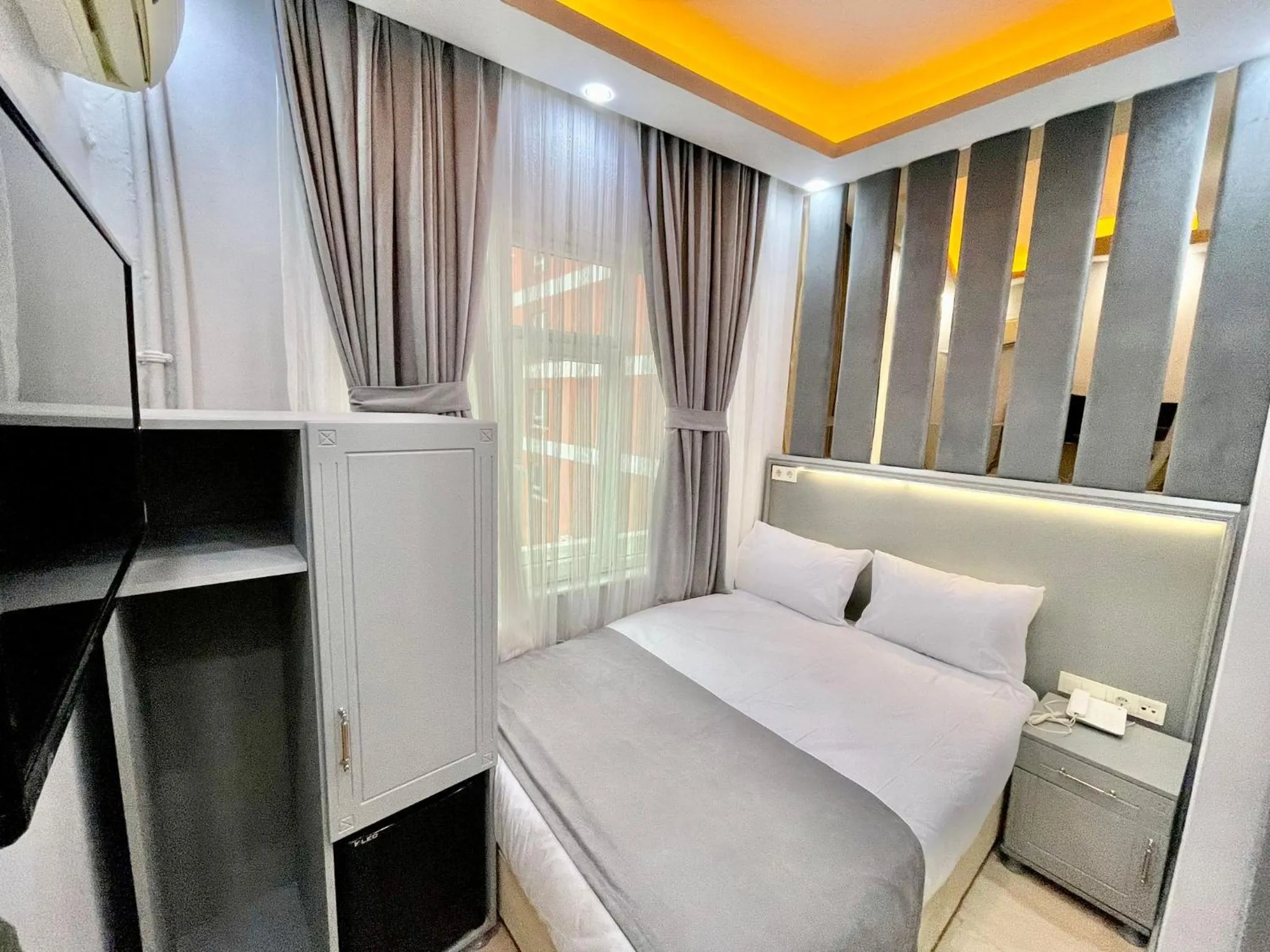 Bed in Crowned Plus Hotel