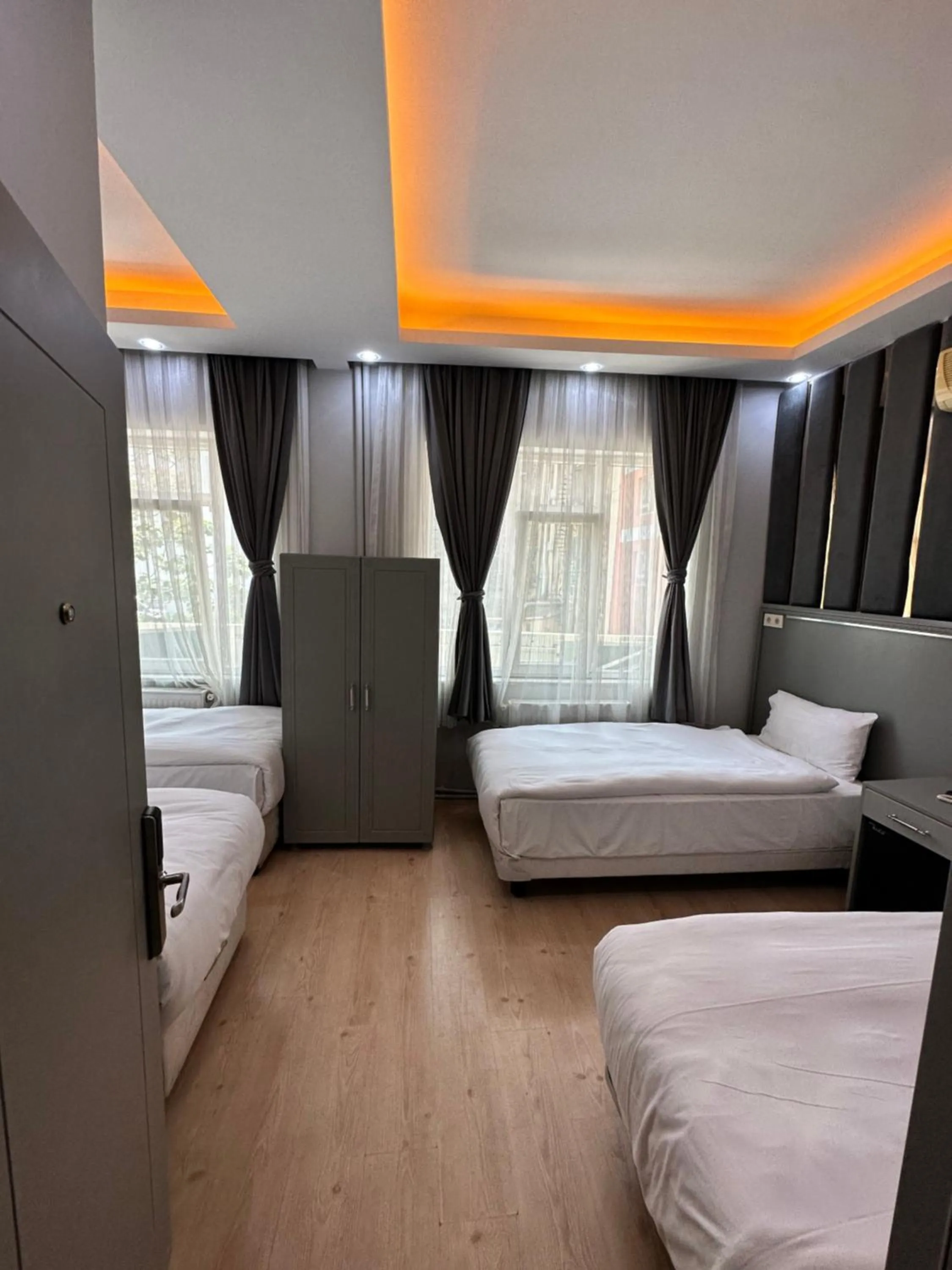 Bed in Crowned Plus Hotel