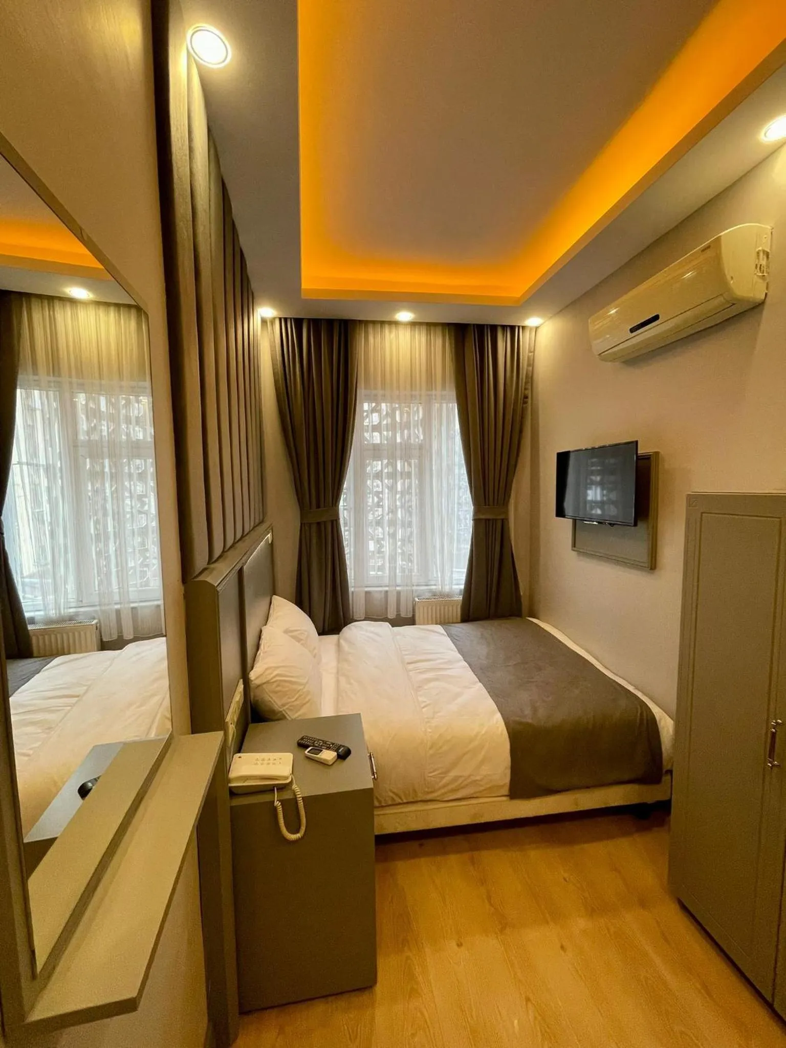 Bed in Crowned Plus Hotel