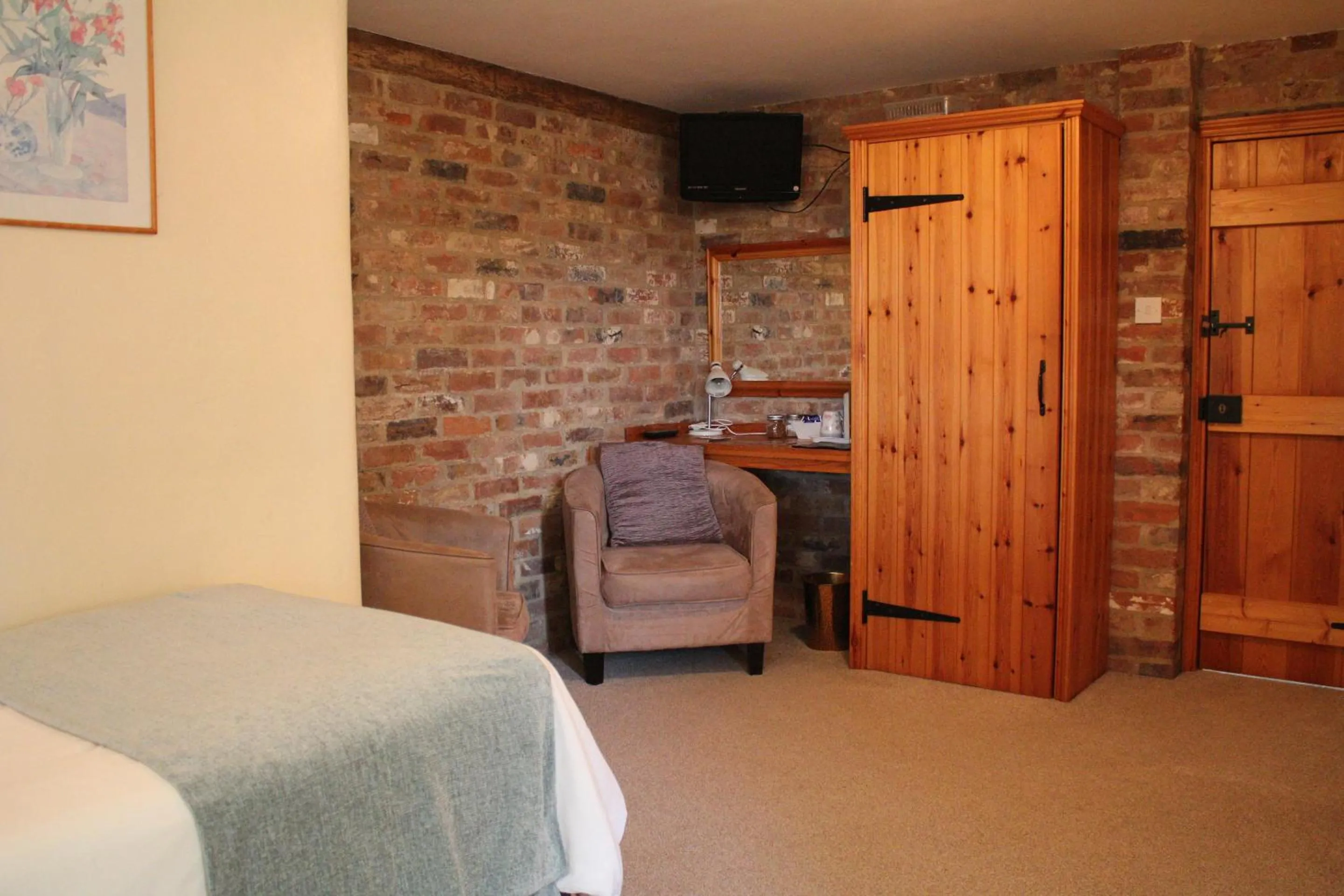Bedroom in Woodman's Farm