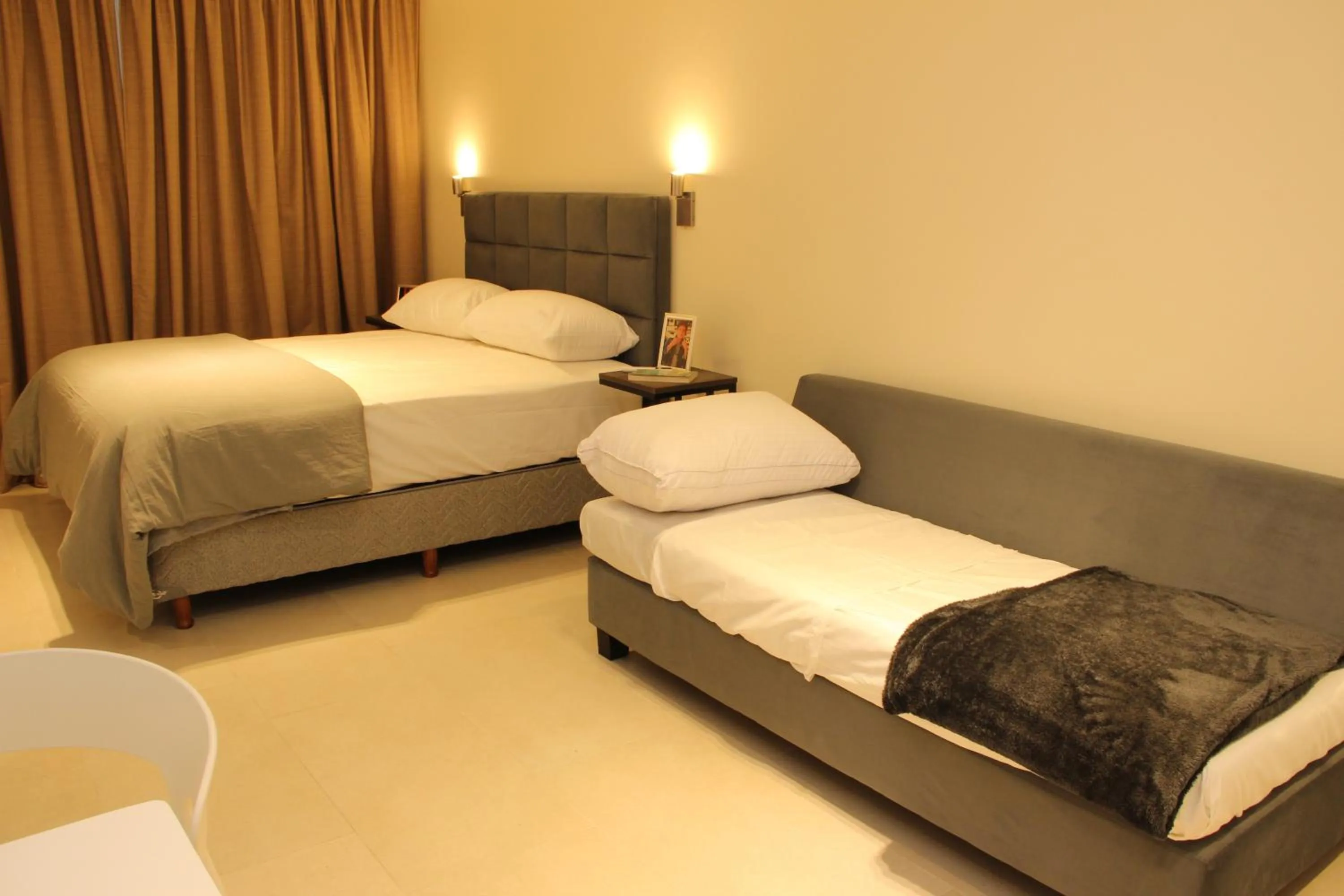 Photo of the whole room, Bed in In House BA - College