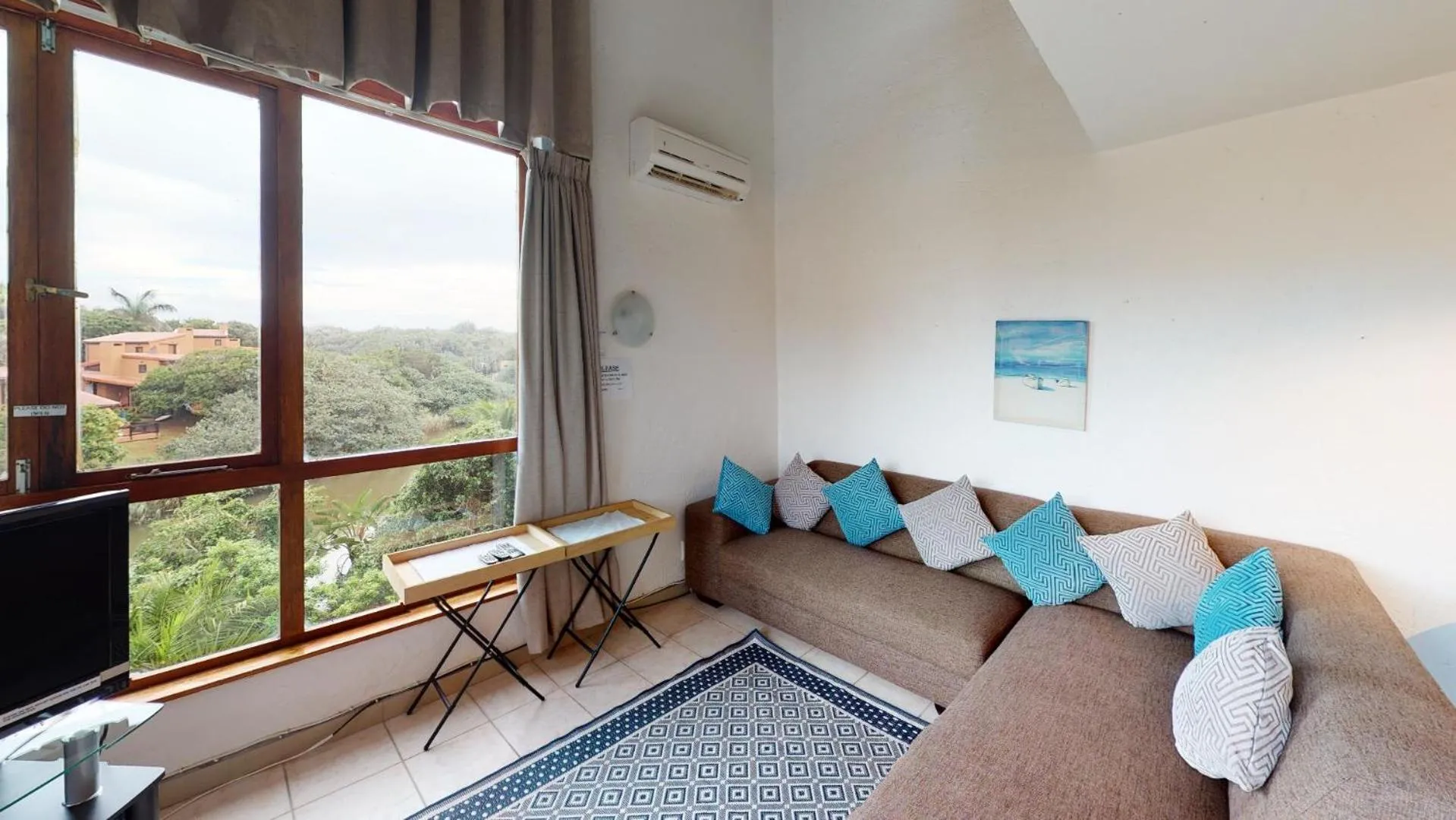 Living room in San Lameer Villa 1916 by Top Destinations Rentals