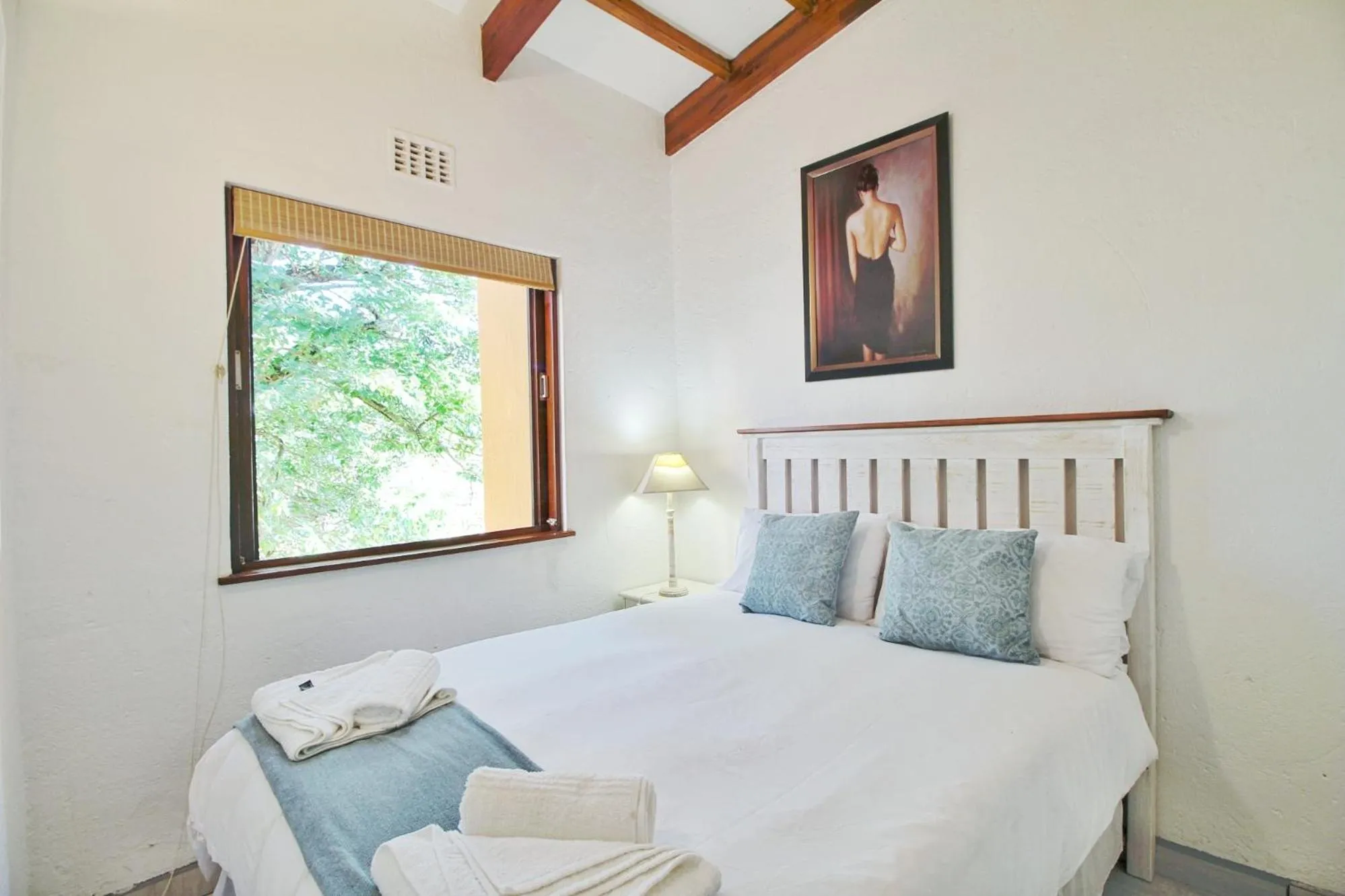 Bed in San Lameer Villa 1916 by Top Destinations Rentals