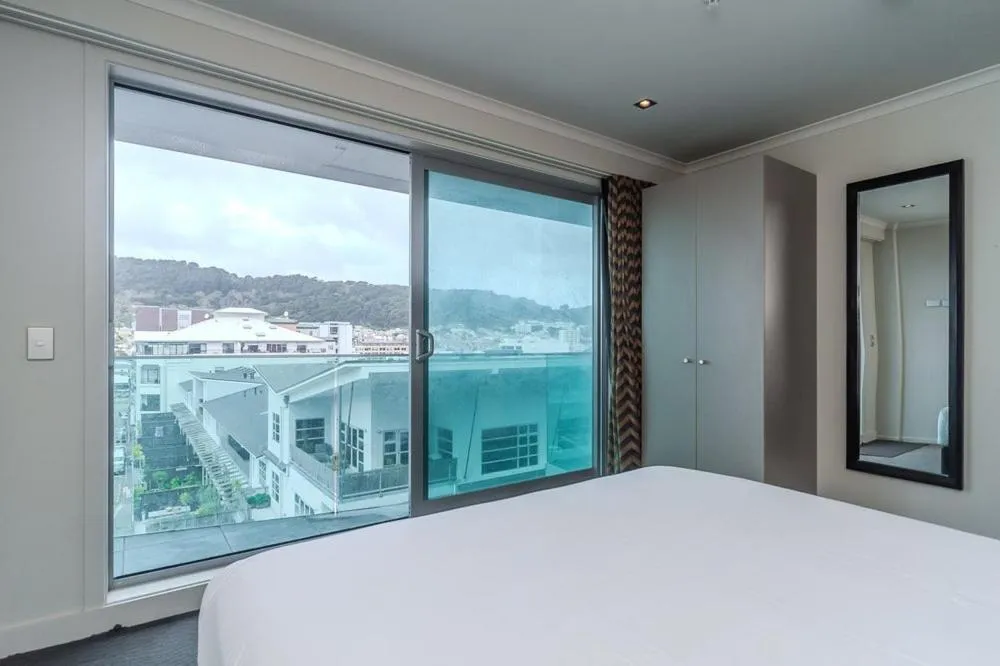 Bed in 70 Tory Apartment Hotel