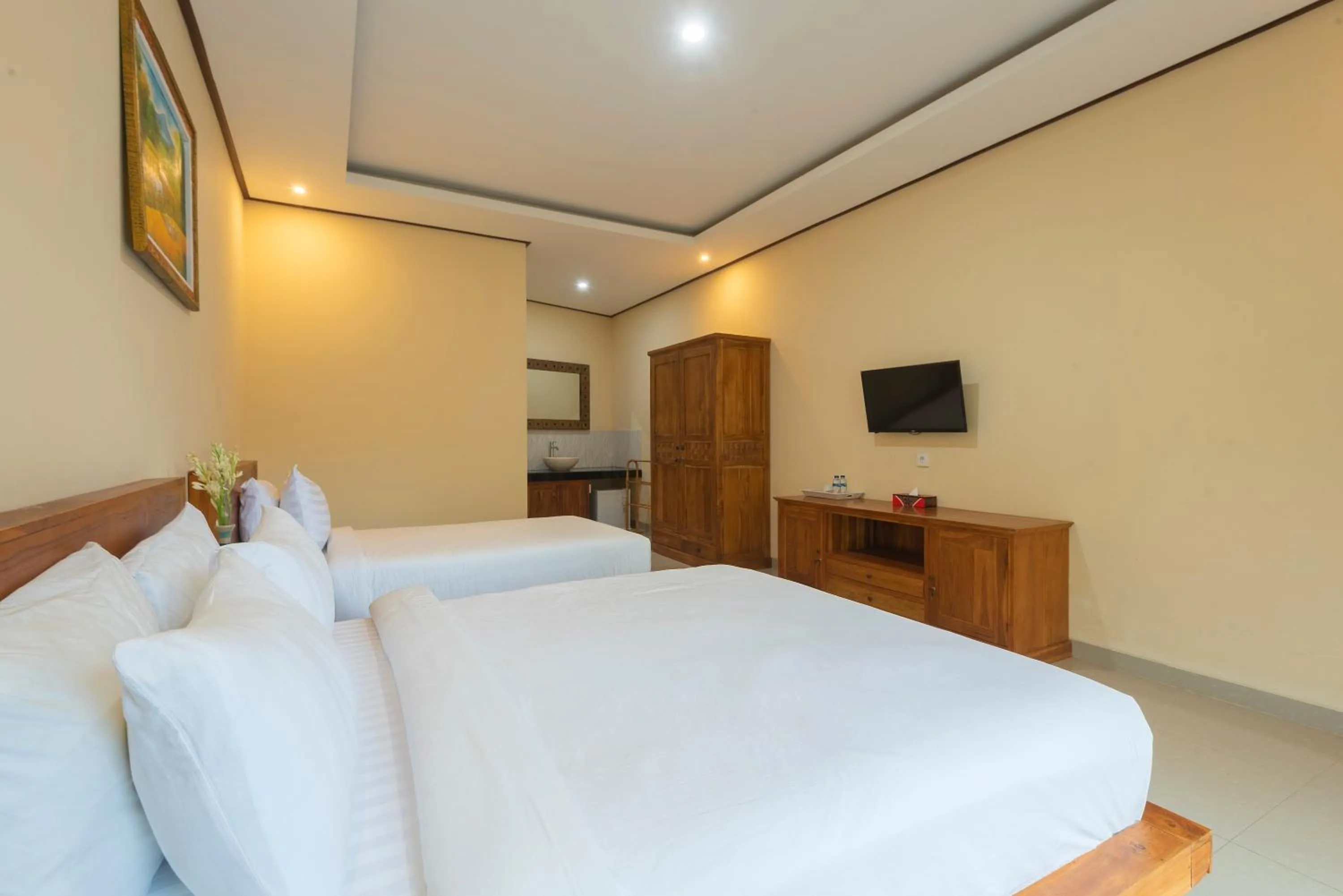Bed in Liliy Guest House Legian