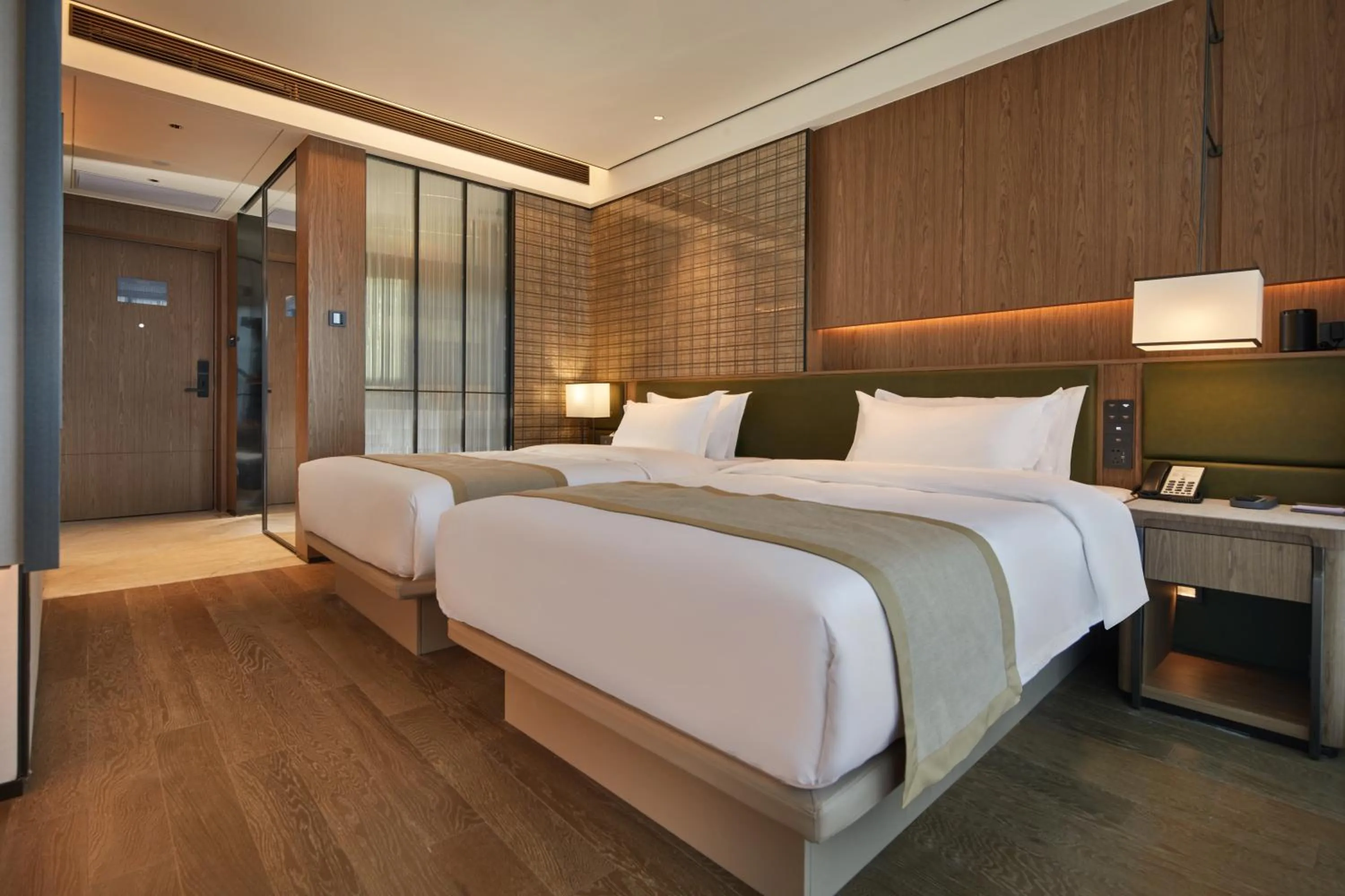 Bed in Dongguan Tangxia Huaman Hotel