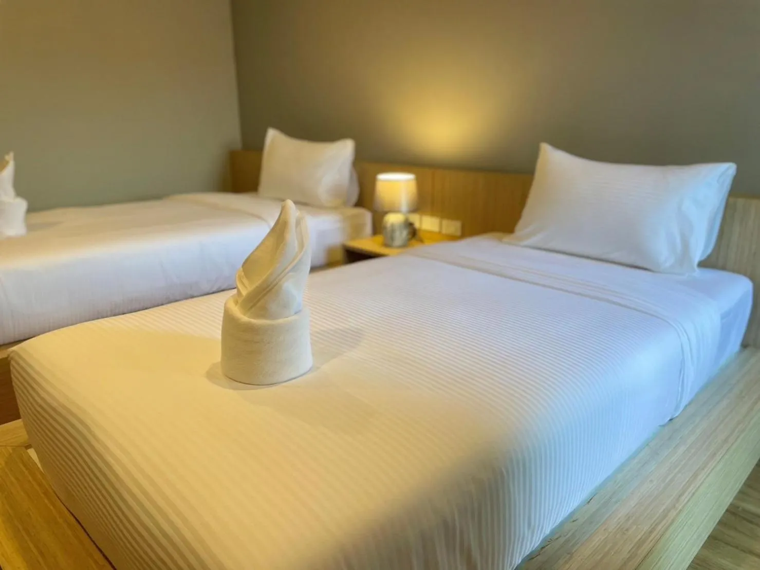 Bed in Klaang Muang Hotel (โรงแรมกลางเมือง)