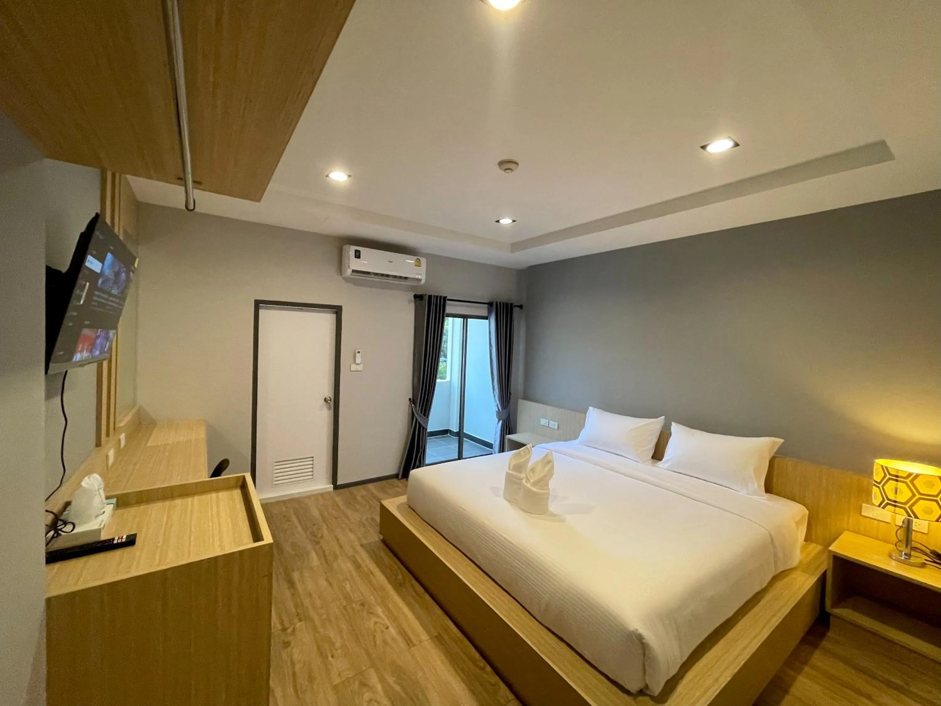 Bed in Klaang Muang Hotel (โรงแรมกลางเมือง)