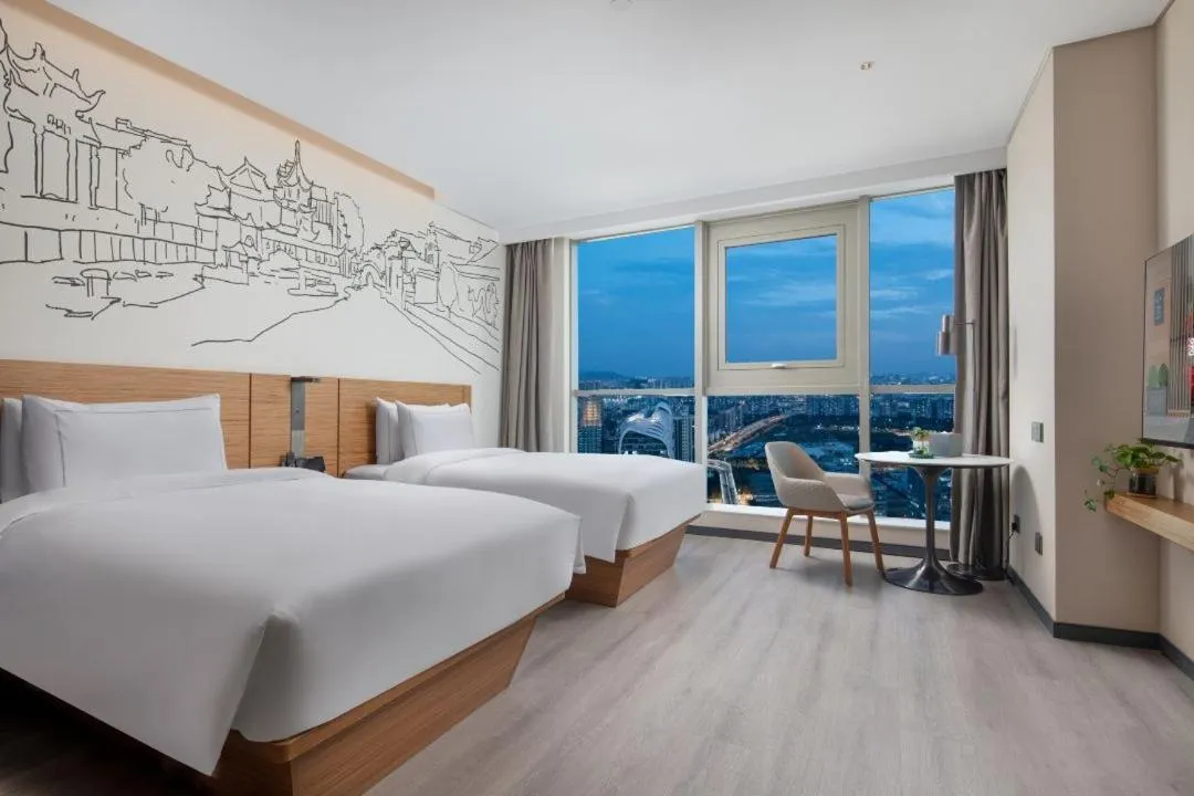 Bed in UrCove by HYATT Nanjing South Railway Station