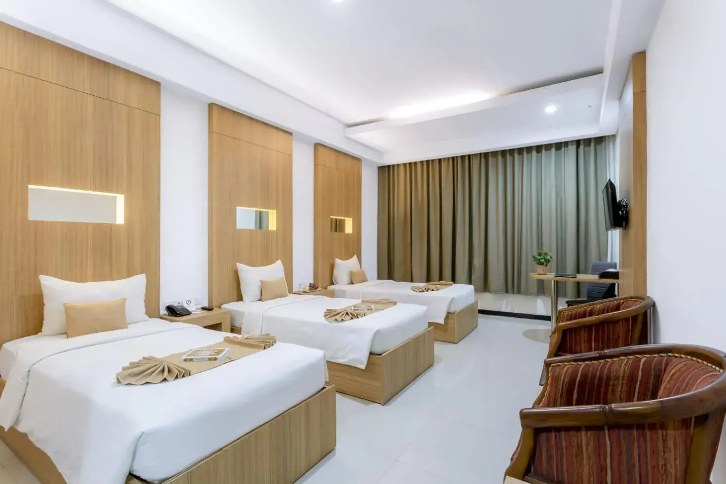 Bed in Sahid Azizah Syariah Hotel and Convention Kendari Bed in Sahid Azizah Syariah Hotel and Convention Kendari