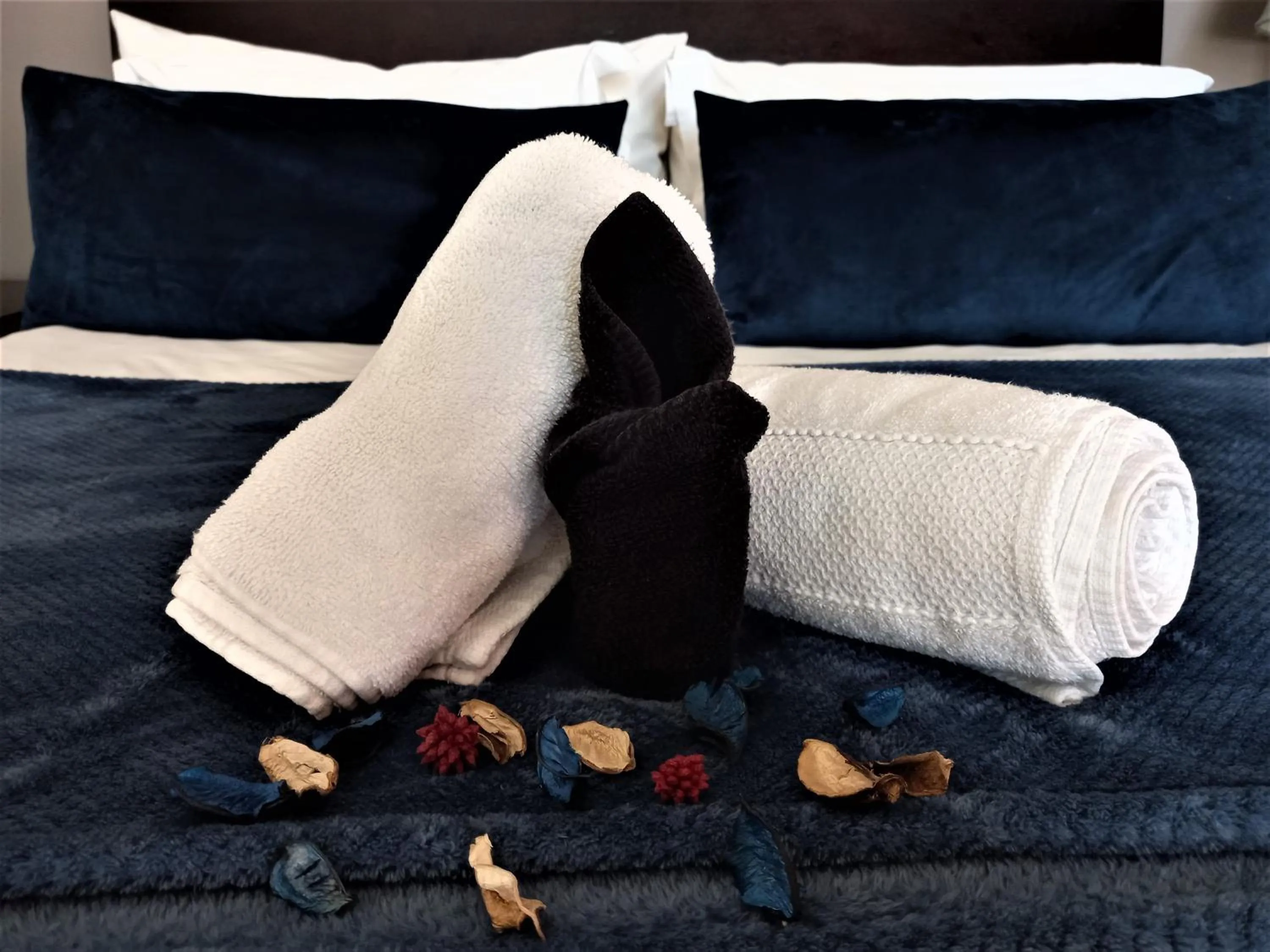 towels, Bed in Mandalay Beach Guest House