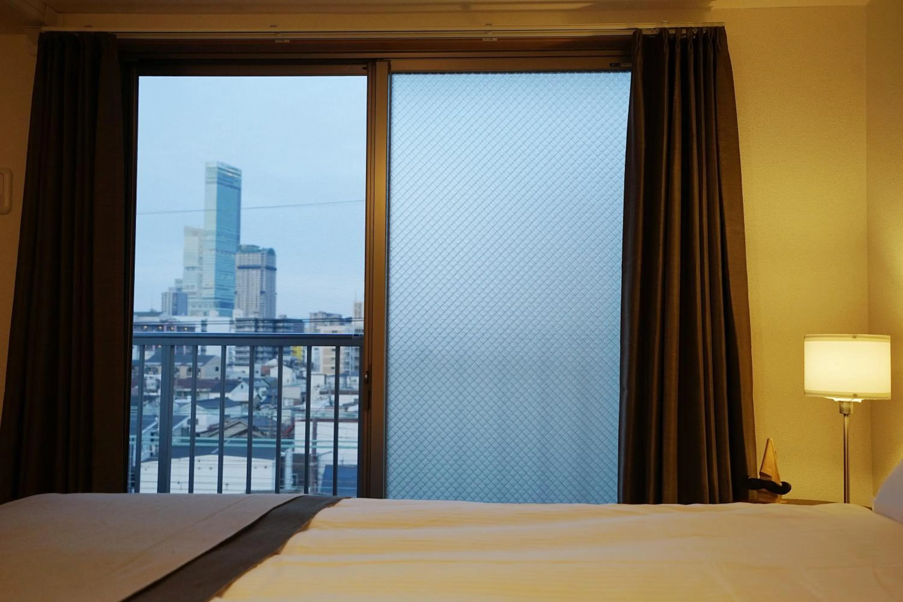 View (from property/room), Bed in Chuan House Nambaminami Hanazonocho