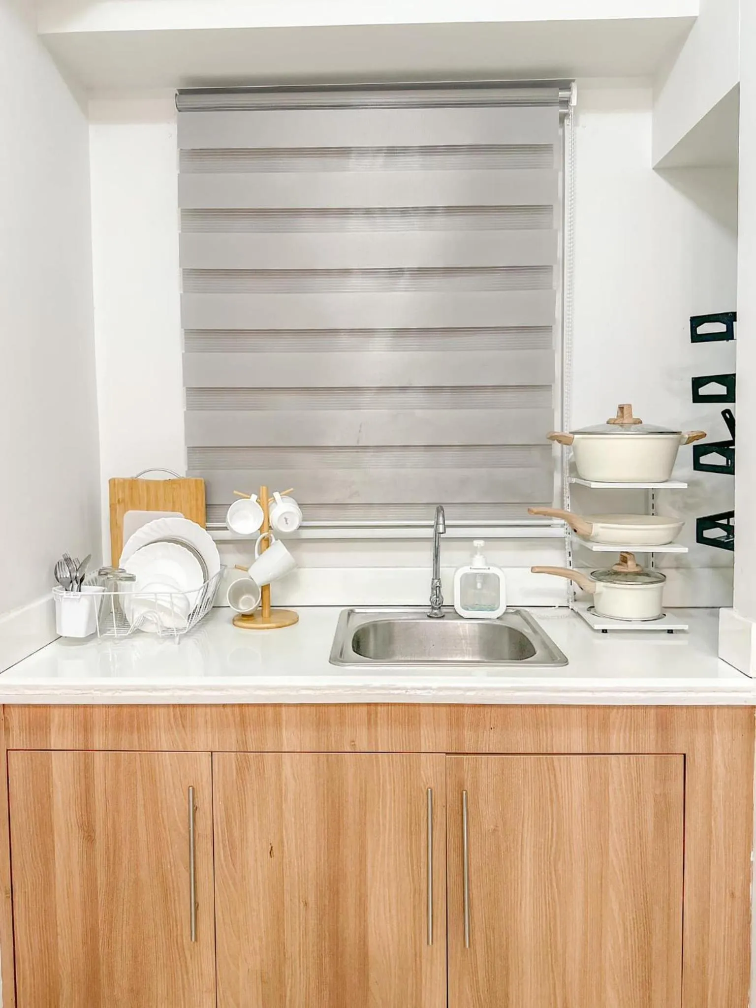 kitchen in Zinnia Towers 1BR Condo with PS4 Karaoke Netflix & Swimming Pool