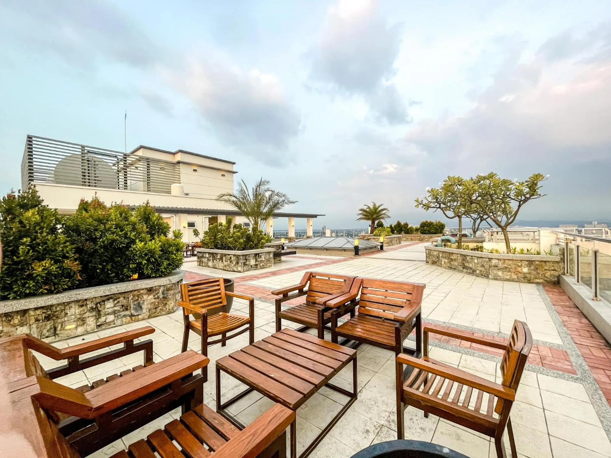 Property building in Zinnia Towers 1BR Condo with PS4 Karaoke Netflix & Swimming Pool